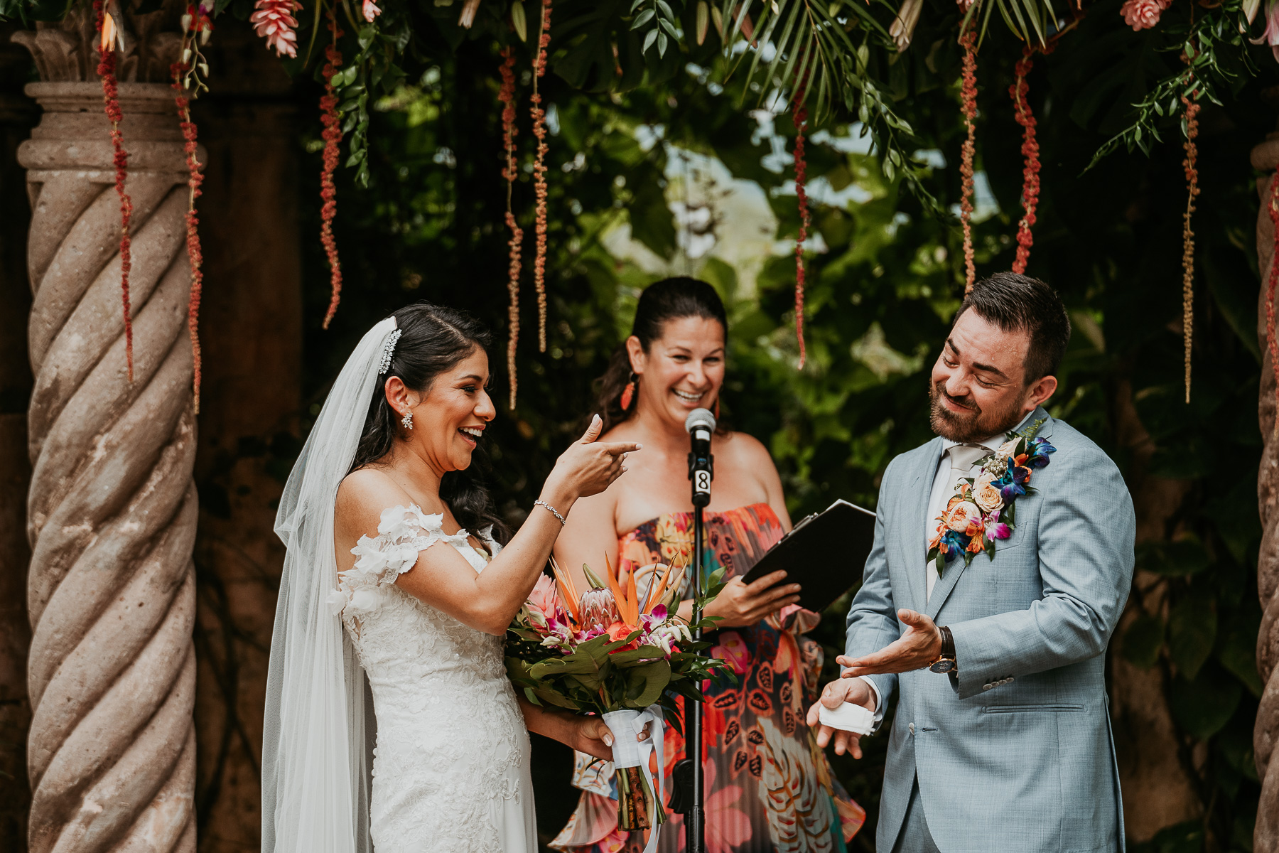 Romantic twilight wedding ceremony at Hacienda Siesta Alegre with guests seated under twinkling lights and lush greenery.