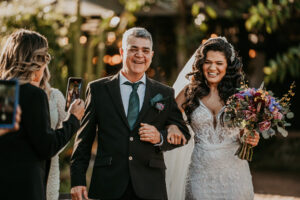 Hacienda Siesta Alegre bride walking down the isle