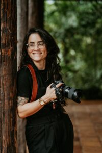 Nilka, a queer-owned wedding photographer in Puerto Rico, capturing a candid moment at an elopement.