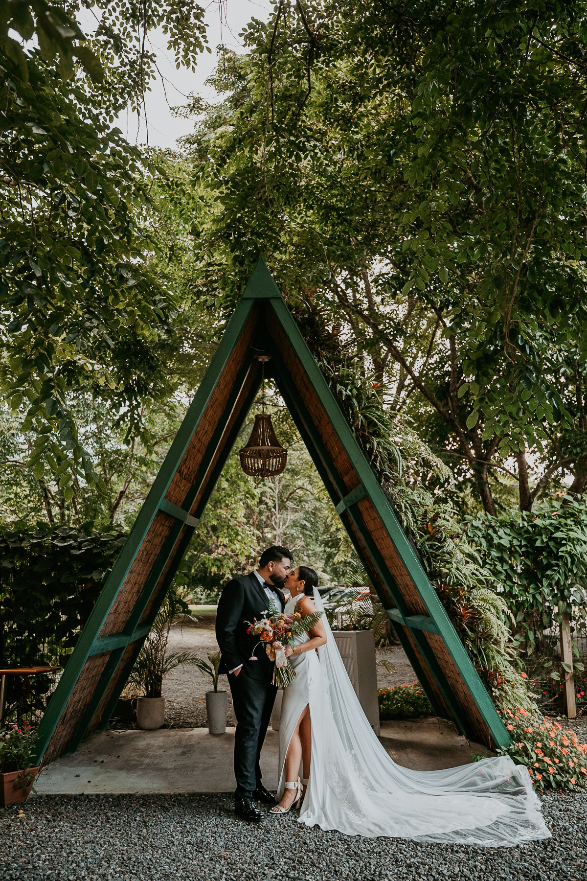 Couple kissing just outside El Refugio, the iconic modern A-frame architecture at Aldeana