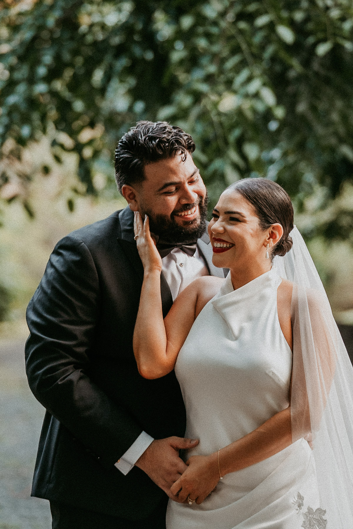 Close up of a couple smiling portraits after their mountain wedding