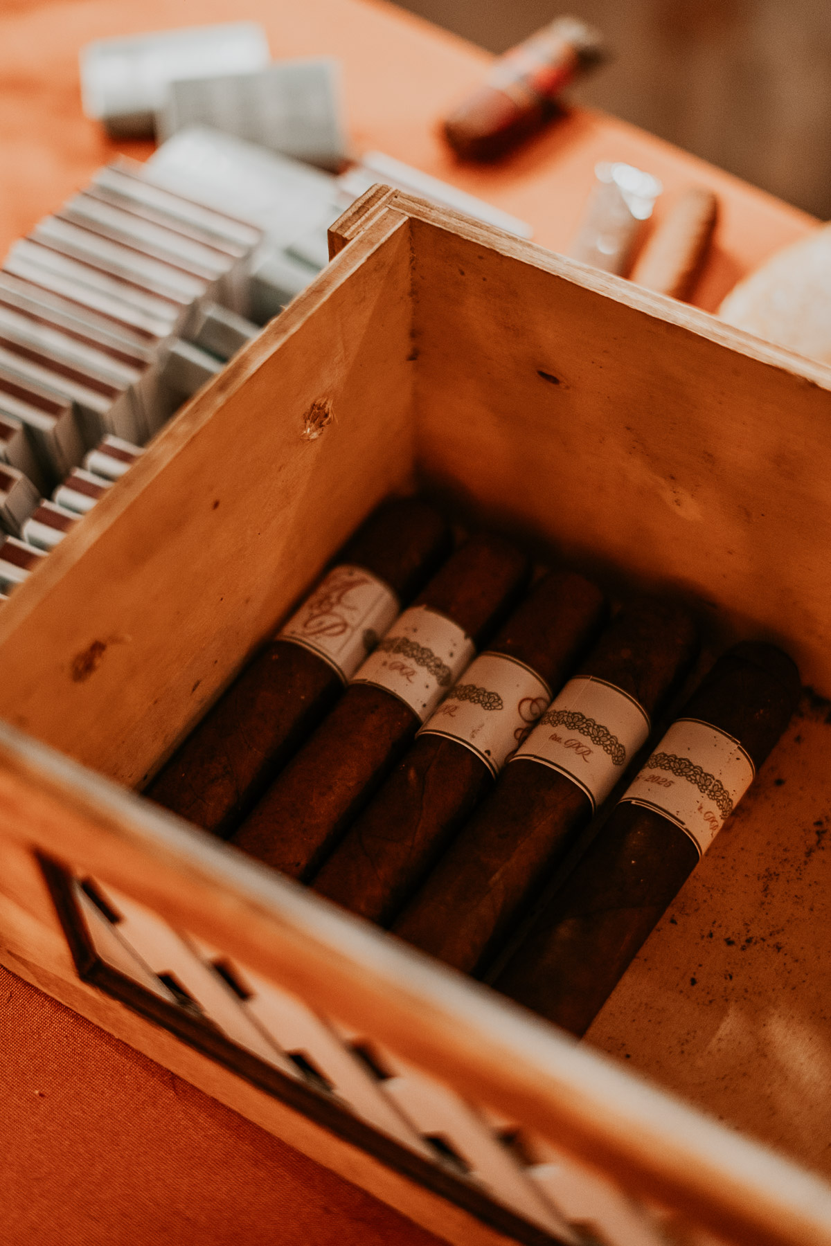 Local artisanal cigars from La Hoja del Chan during a reception at a Puerto Rico mountain wedding.