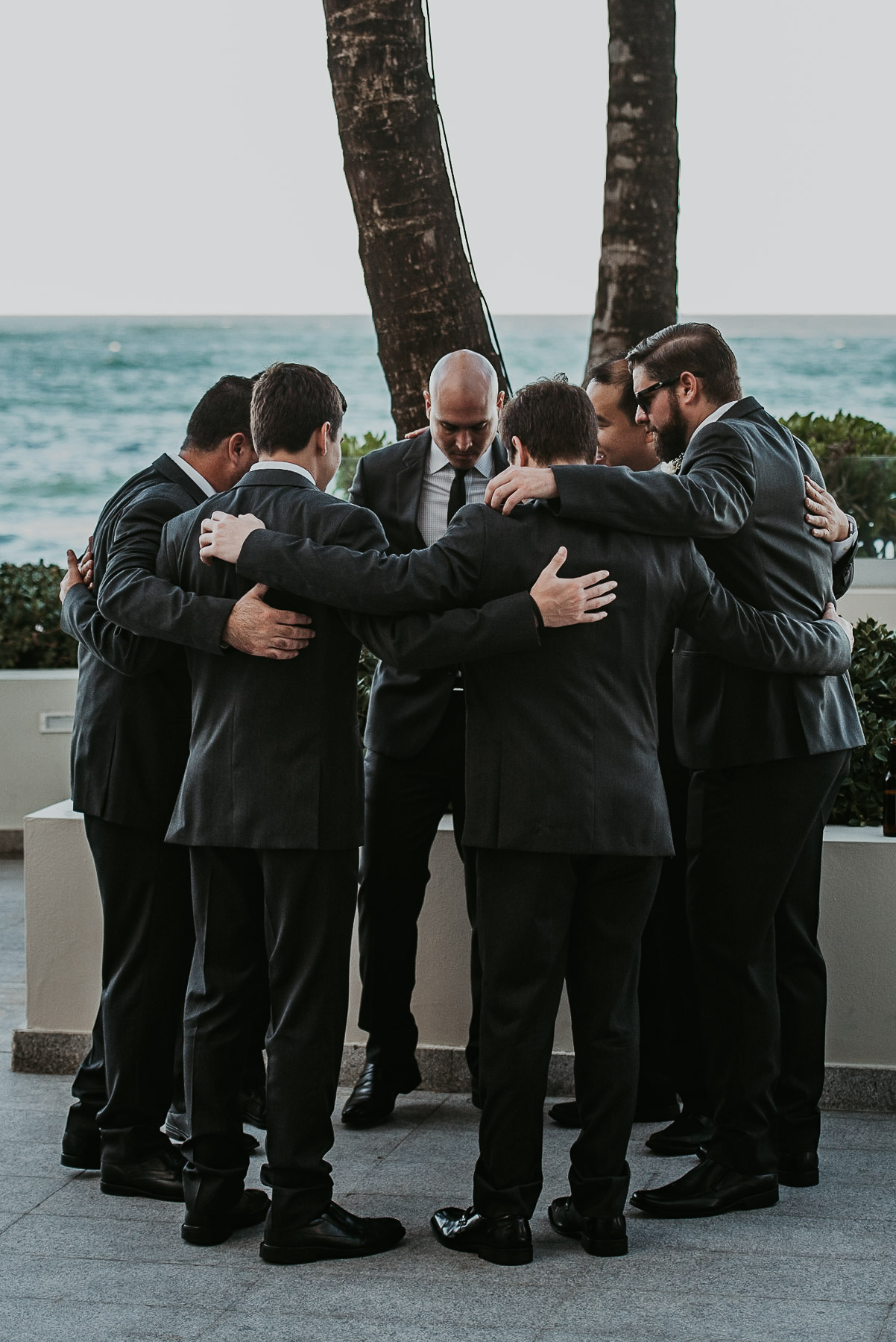 Emotional Moment of Groom and Groomsmen before wedding ceremony at La Concha Resort.