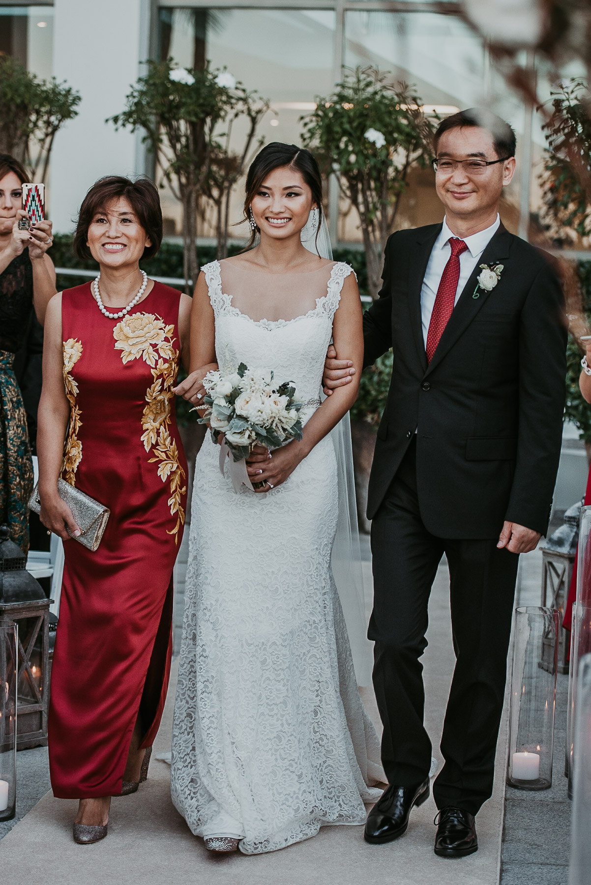 Annie walking down the aisle at La Concha Resort’s Ocean Pool Terrace.