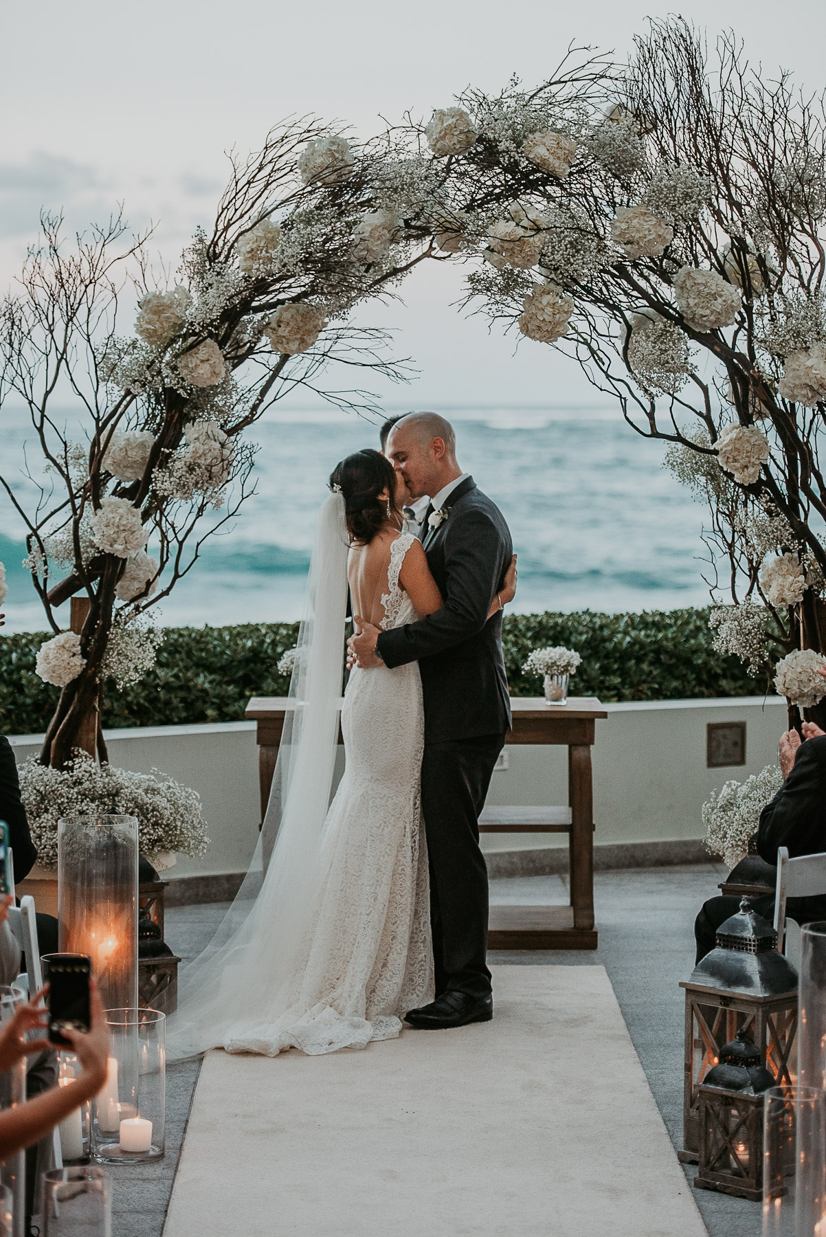 Annie and Daniel’s first kiss as husband and wife during their La Concha wedding ceremony. 