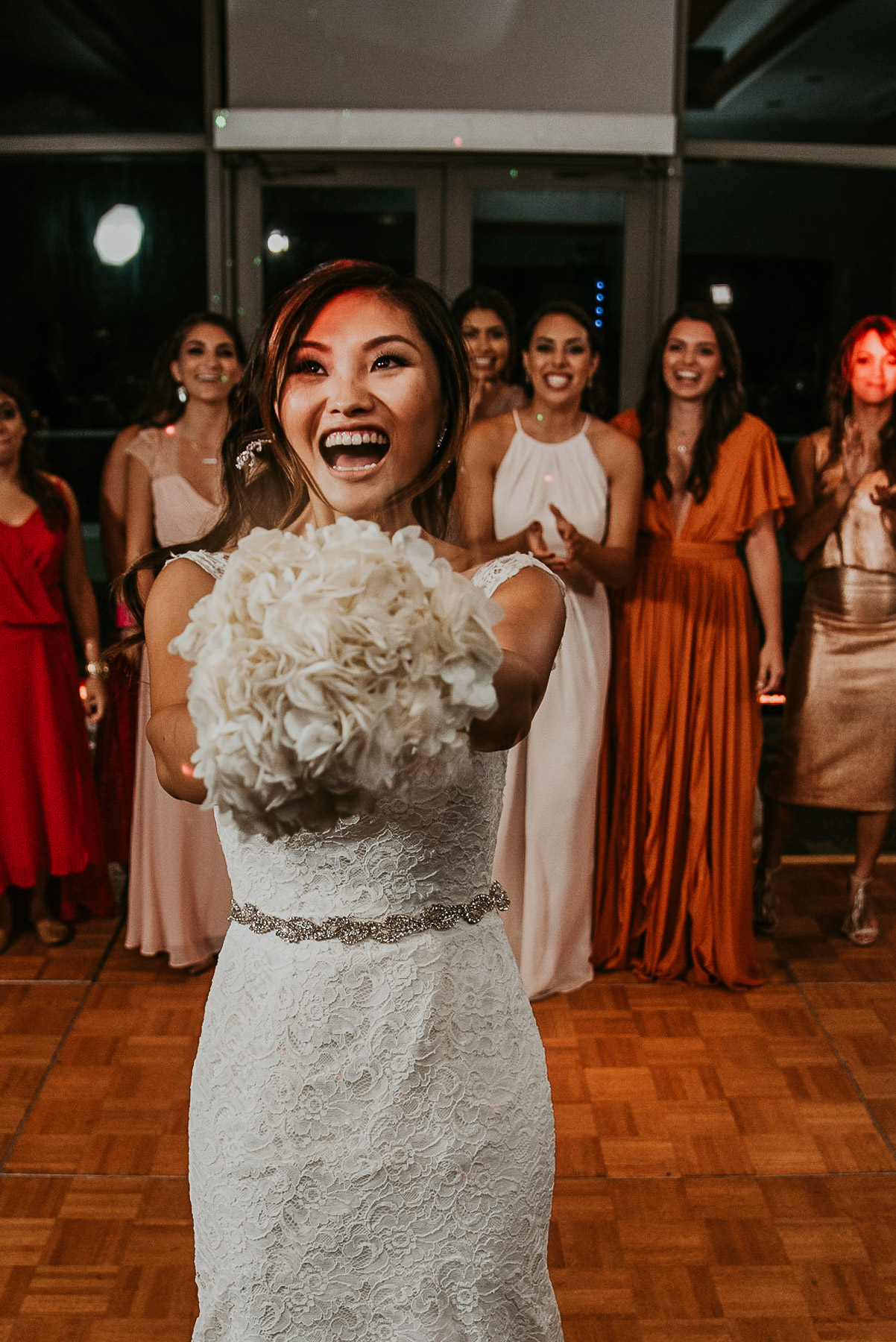 Bouquet toss at Salon Indigo at La Concha Wedding.