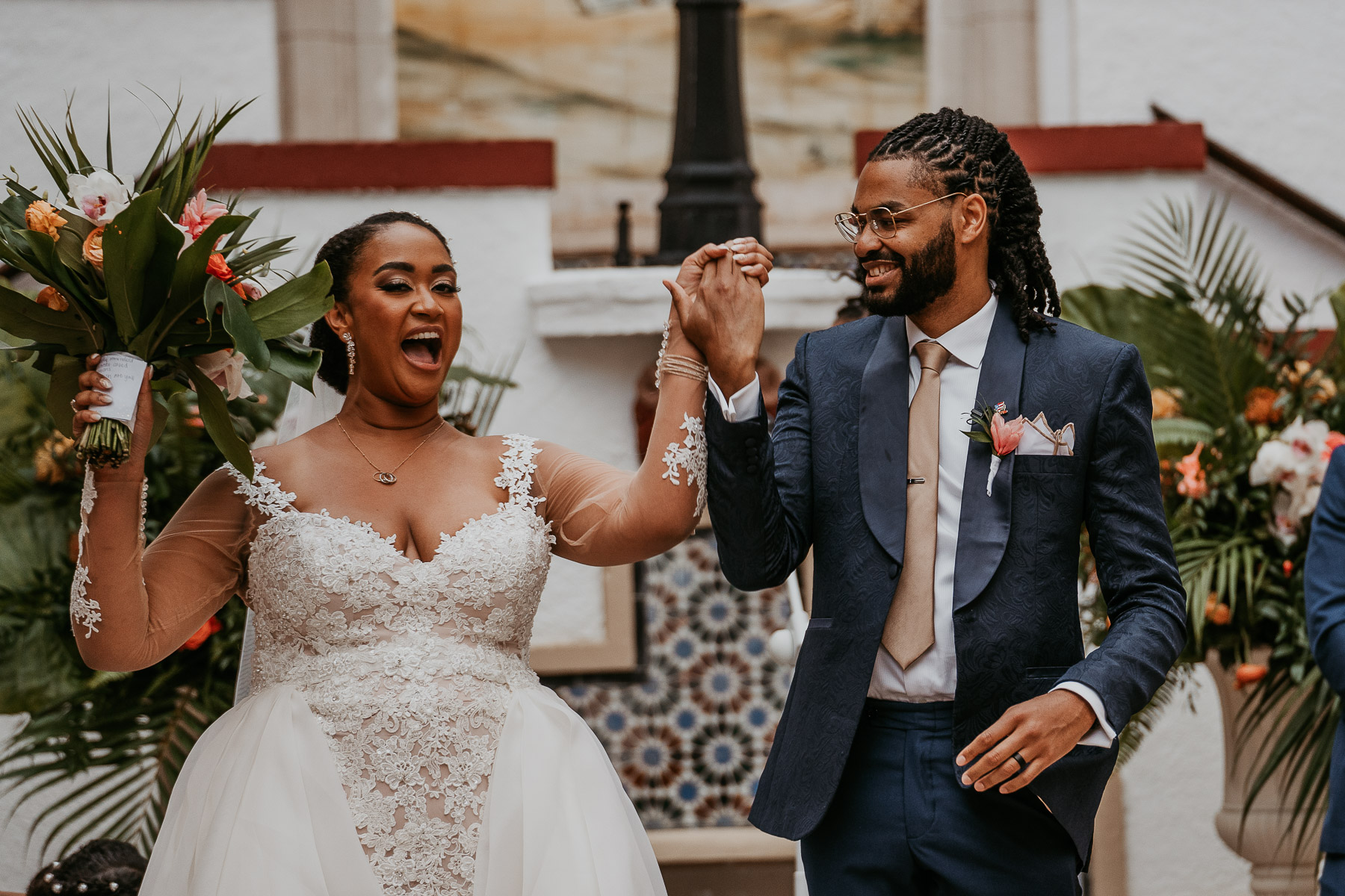 Casa de España Wedding Ceremony: Bride and Groom Jumping the Broom