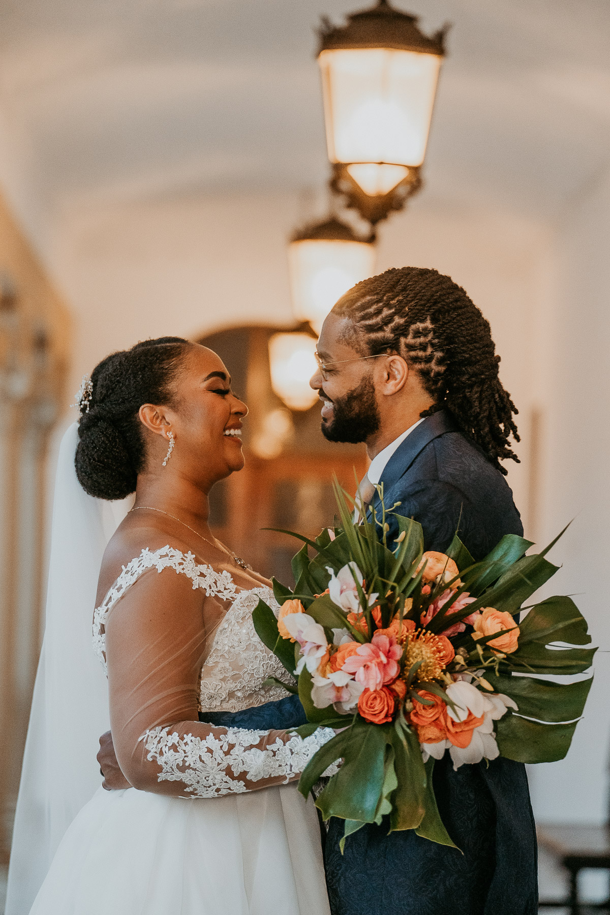 Bride and groom candid moments at Casa de España's romantic corridors