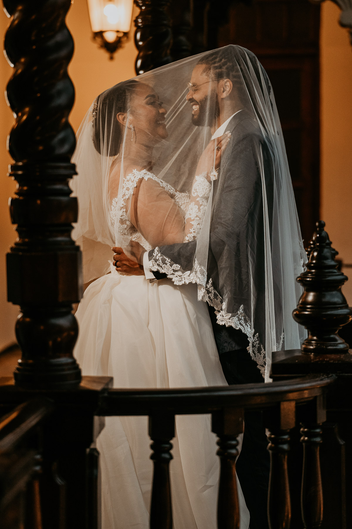 Newlyweds Share a Romantic Moment on Casa de España’s Balcony