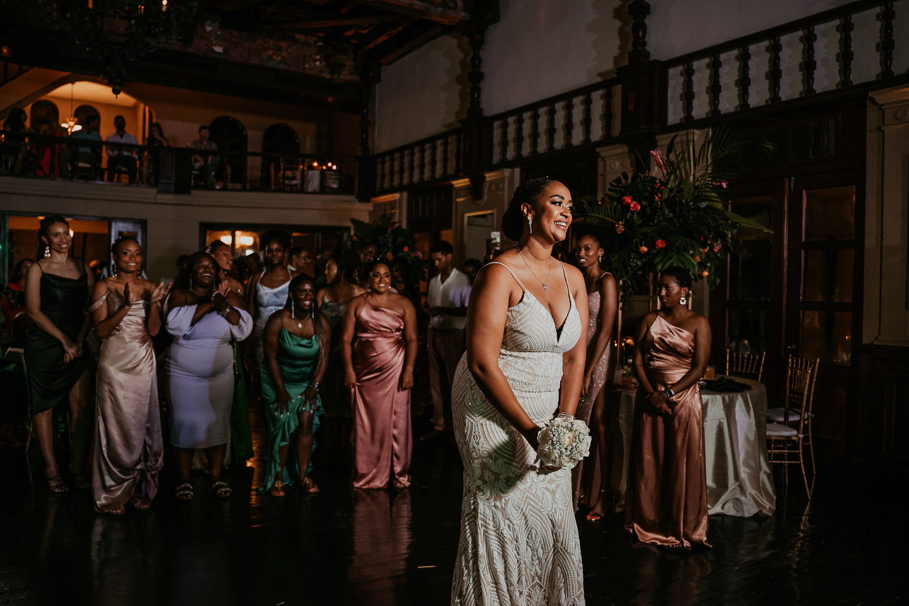 Bride bouquet toss at Casa de España wedding.