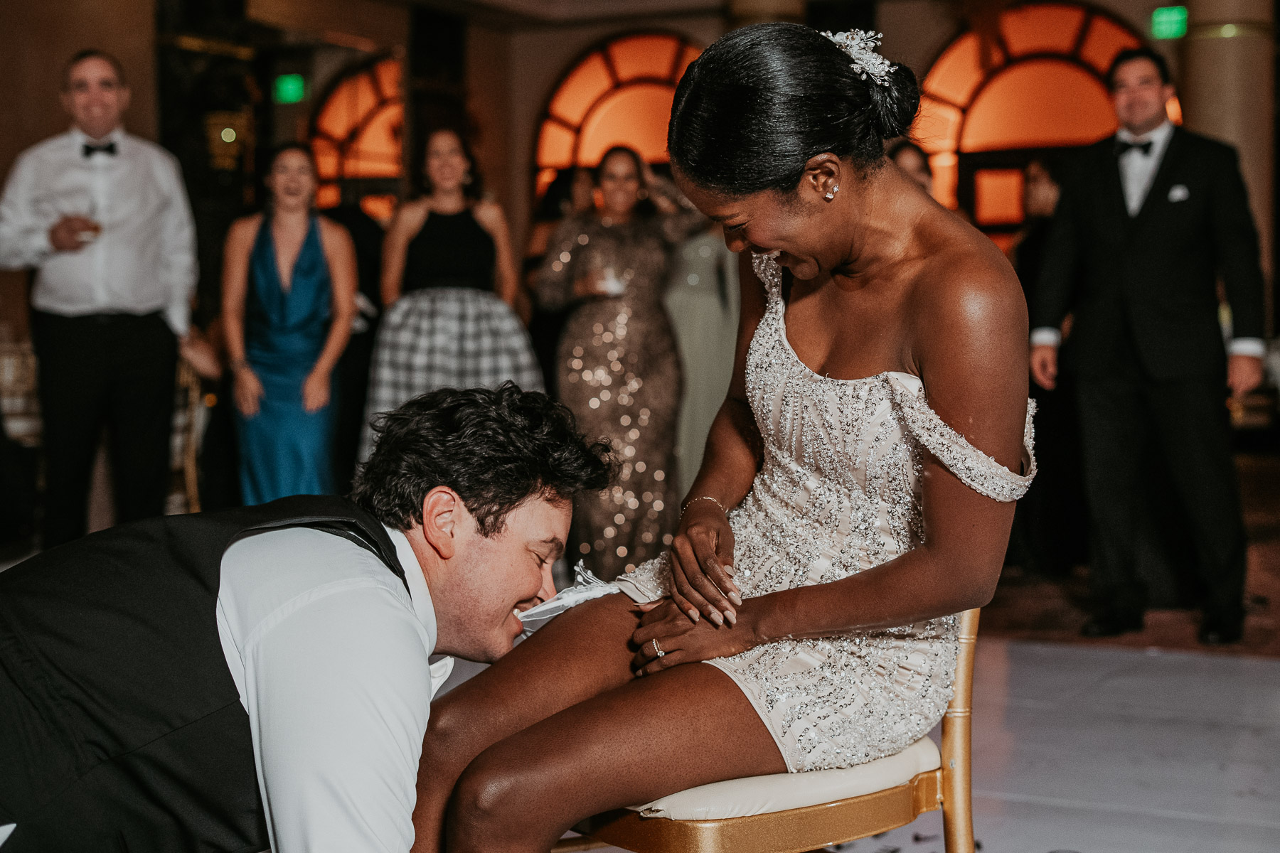 Garter toss moment at Condado Vanderbilt Wedding