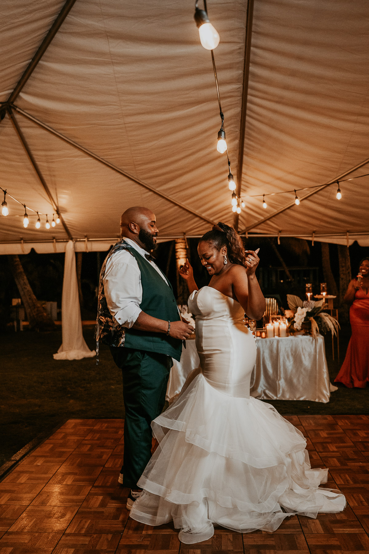 Newlywed couple sharing their first dance during their Copamarina Beach Resort wedding reception in Puerto Rico.