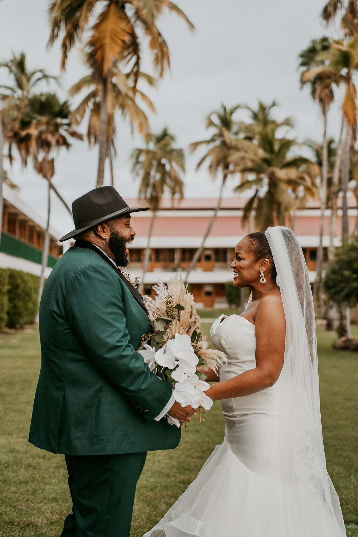 Bride and groom sharing an emotional first look before their Copamarina Beach Resort wedding ceremony in Puerto Rico.