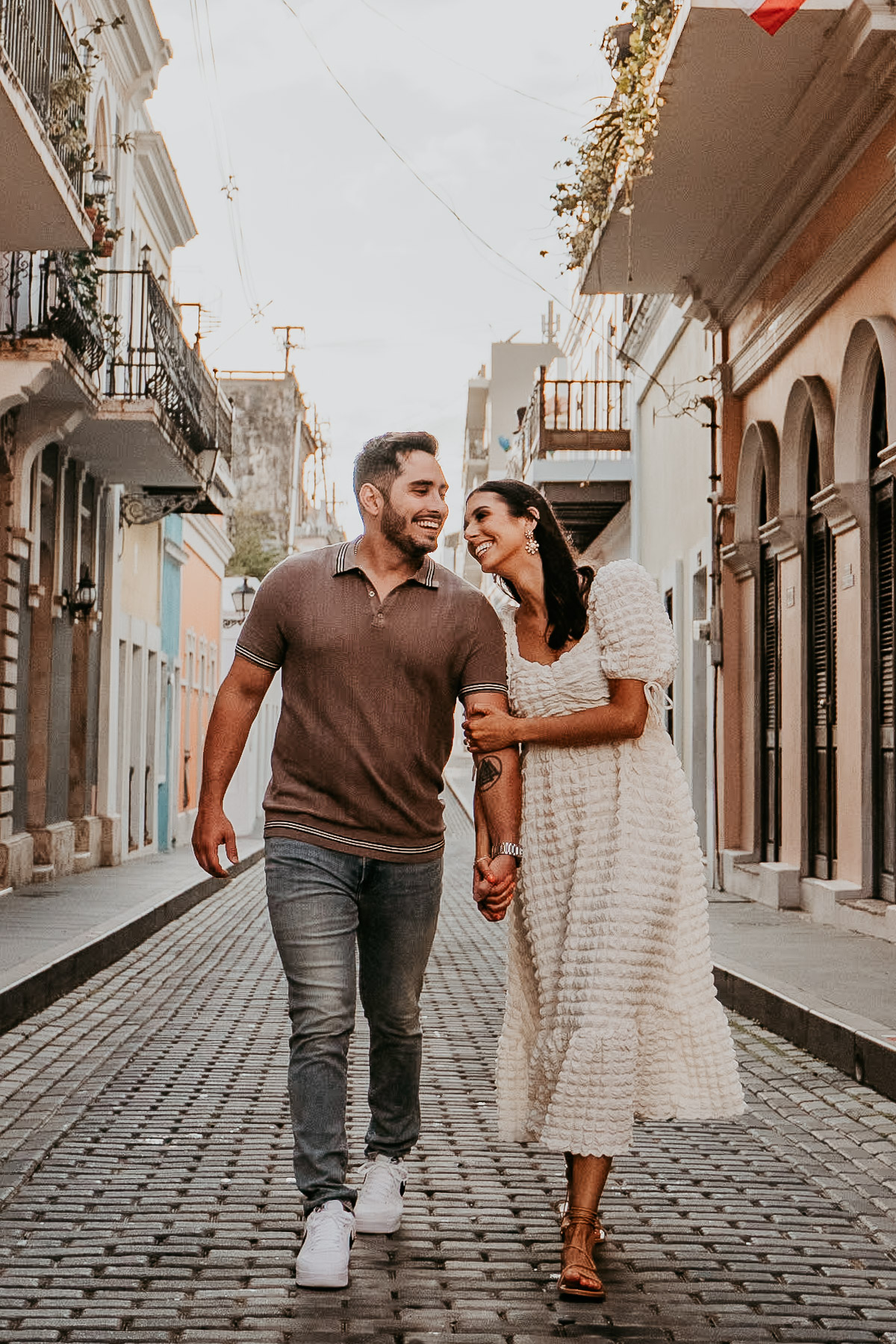 Natural, unposed couple’s portrait in Old San Juan's hidden streets.