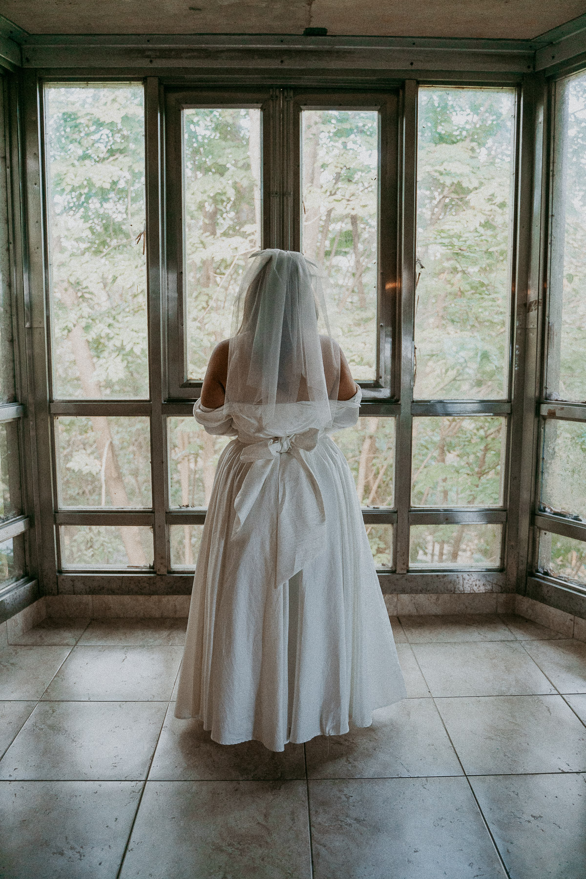 Bride looking away at Dos Aguas Elopement.