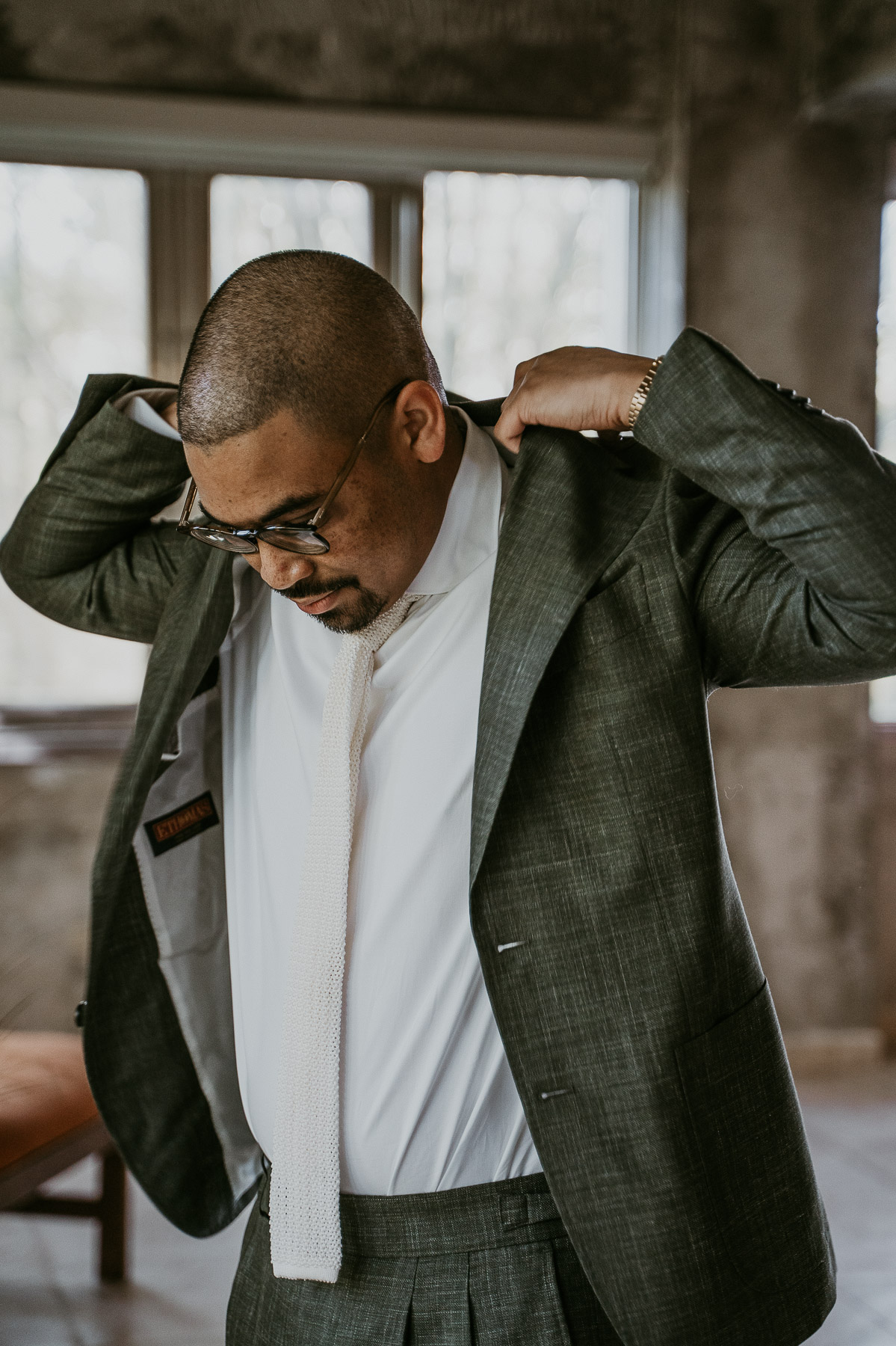 Groom getting ready at Dos Aguas Elopement.