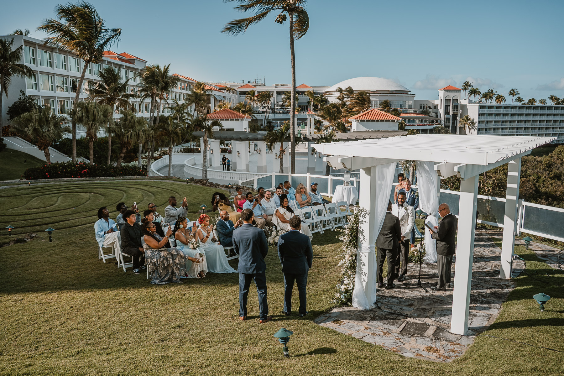 Bright sunny ceremony at El Conquistador Resort wedding venue