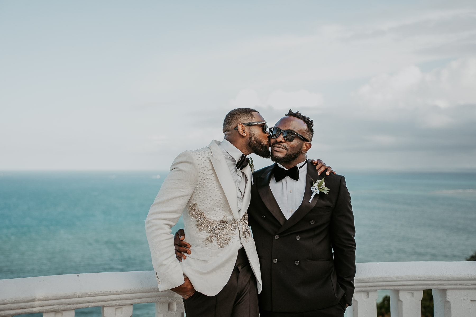 Wedding portraits of couple with ocean backdrop at El Conquistador Resort