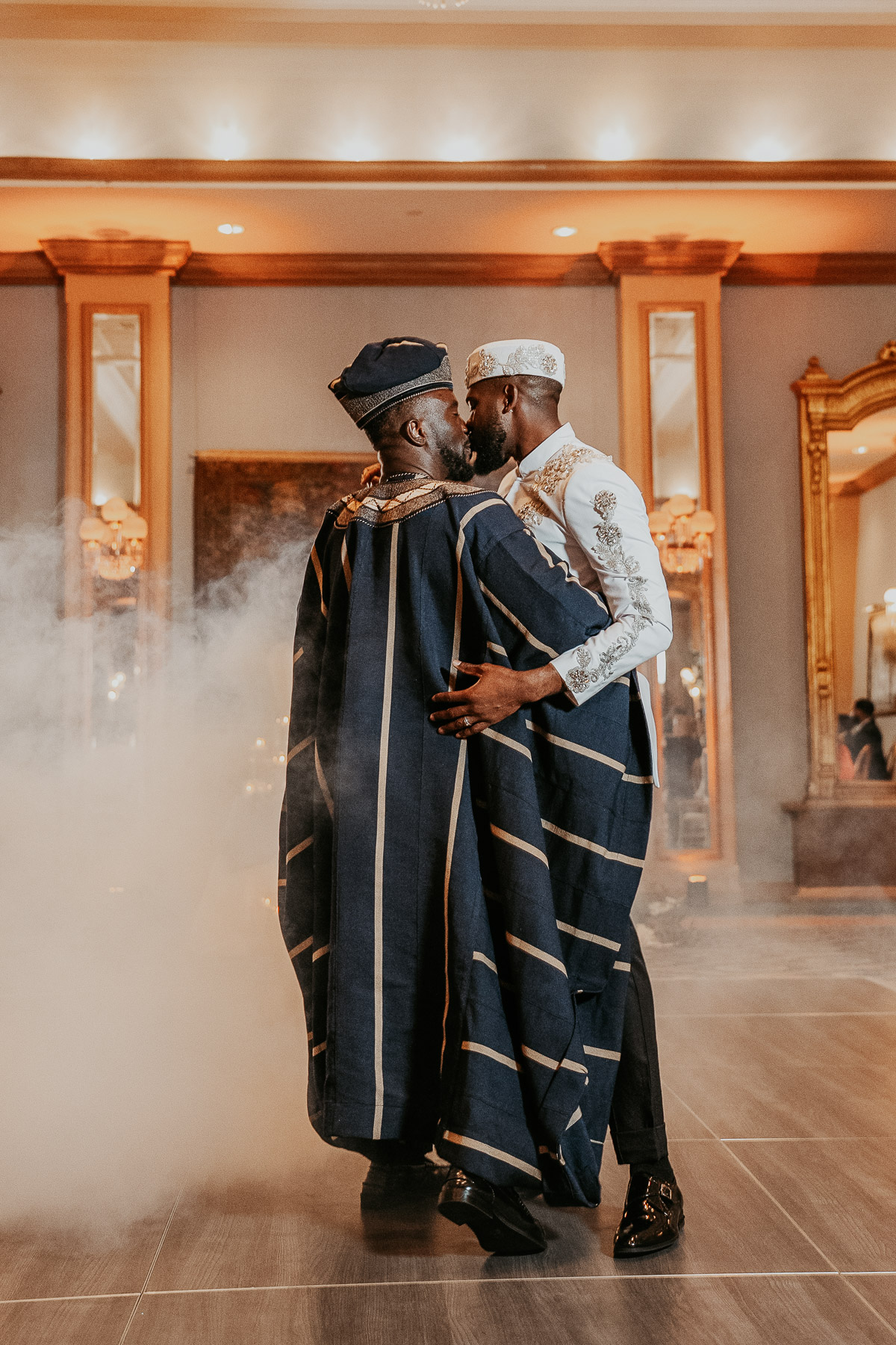 First dance between grooms during intimate wedding reception celebration