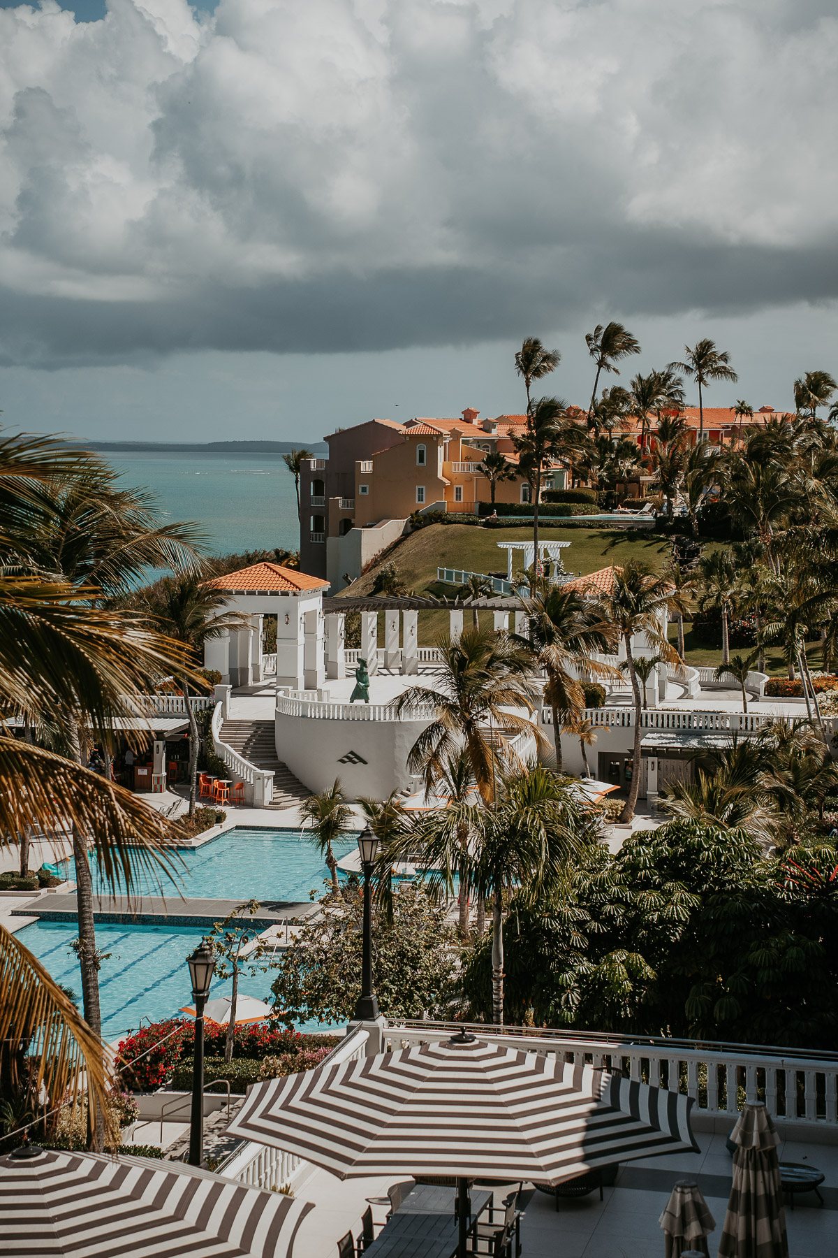 Poolside view at El Conquistador Resort overlooking the ocean during wedding day