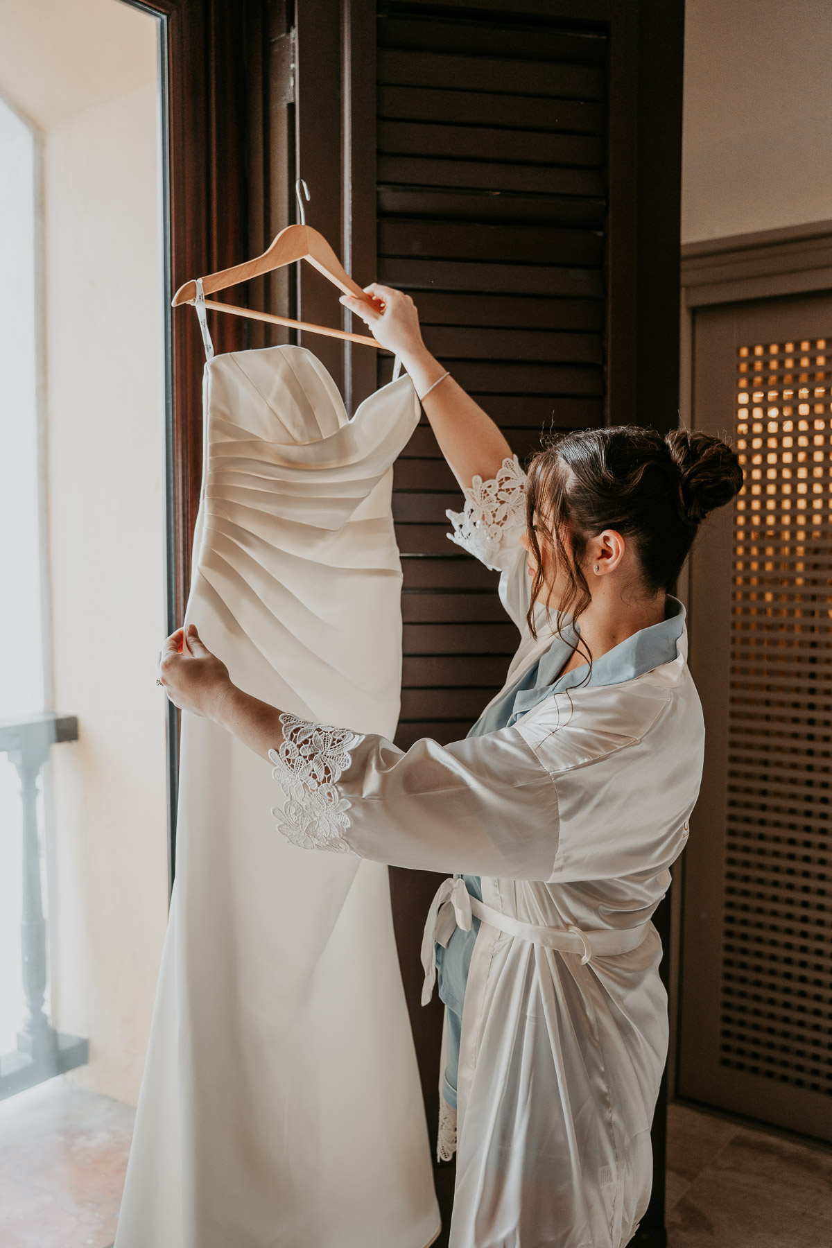 Bride looking at her dress Hotel El Convento