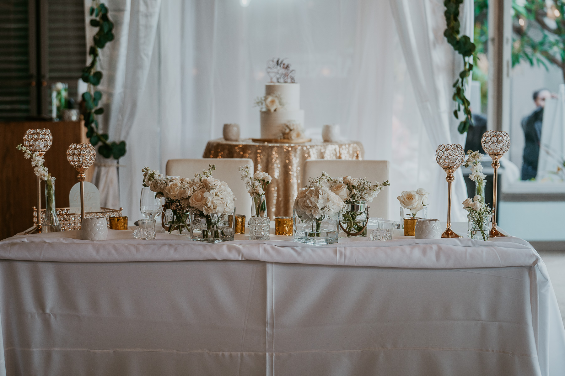 Bride and groom table with white flowers at Copamarina Beach Resort Micro wedding.