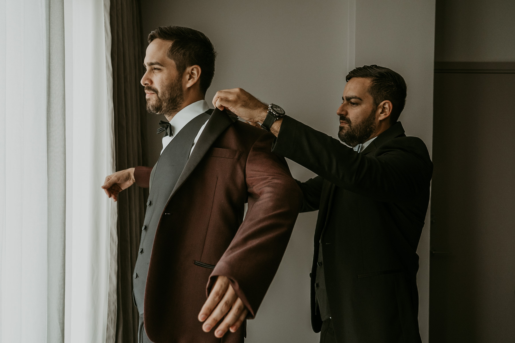 Groom getting ready at Fairmont El San Juan Hotel