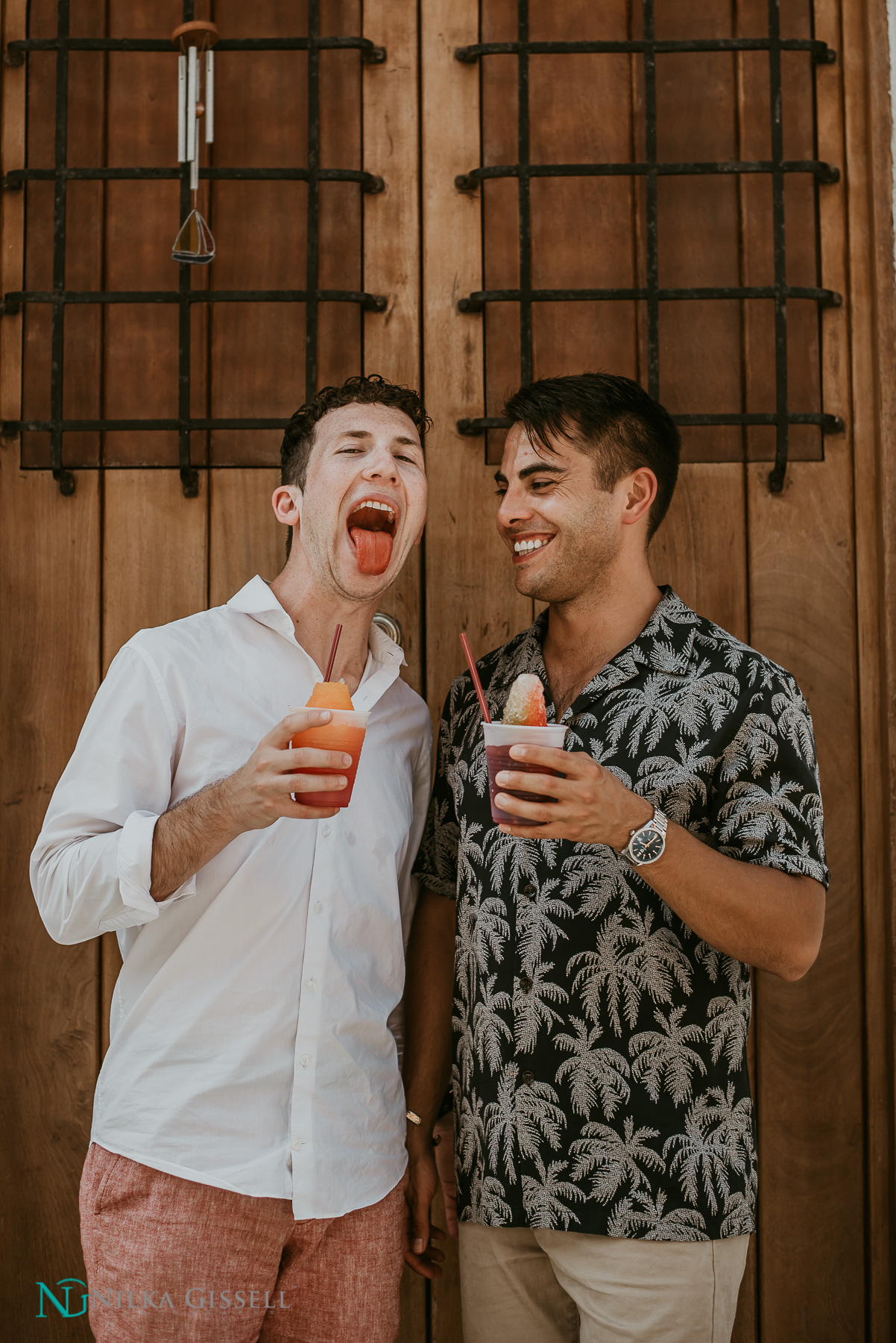 Gay Couple eating a Piragua at Old San Juan.