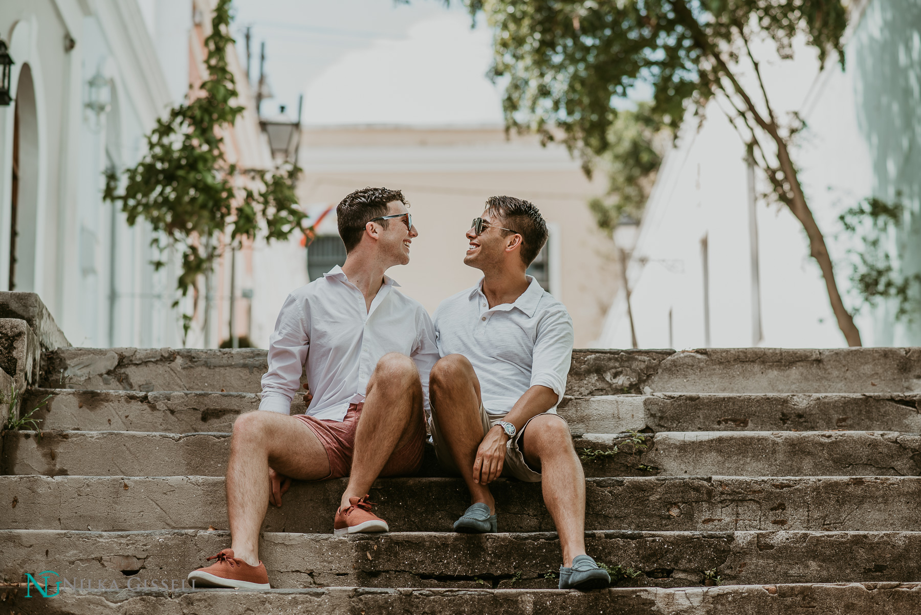 LGBTQ+ Couple on stairs at Old San Juan.