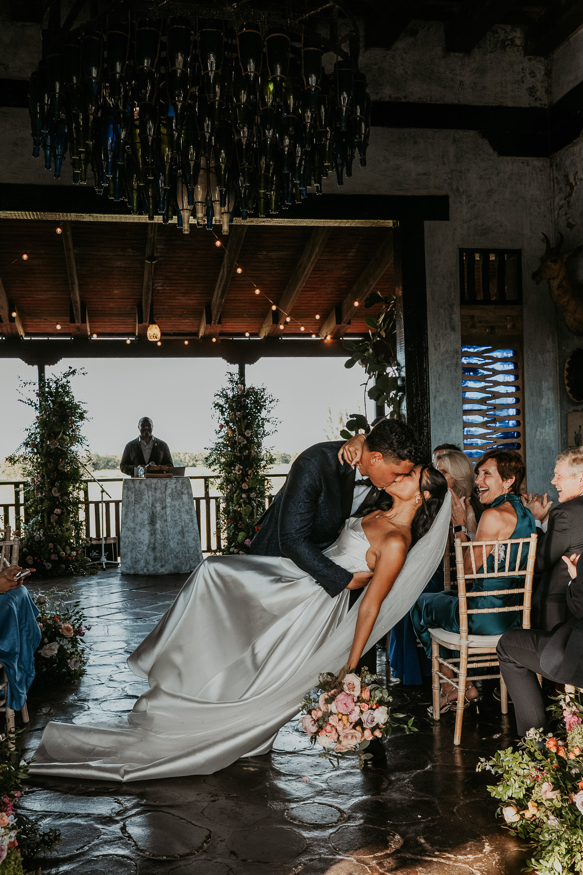 Groom dips bride after saying I do at Hacienda Campo Rico.