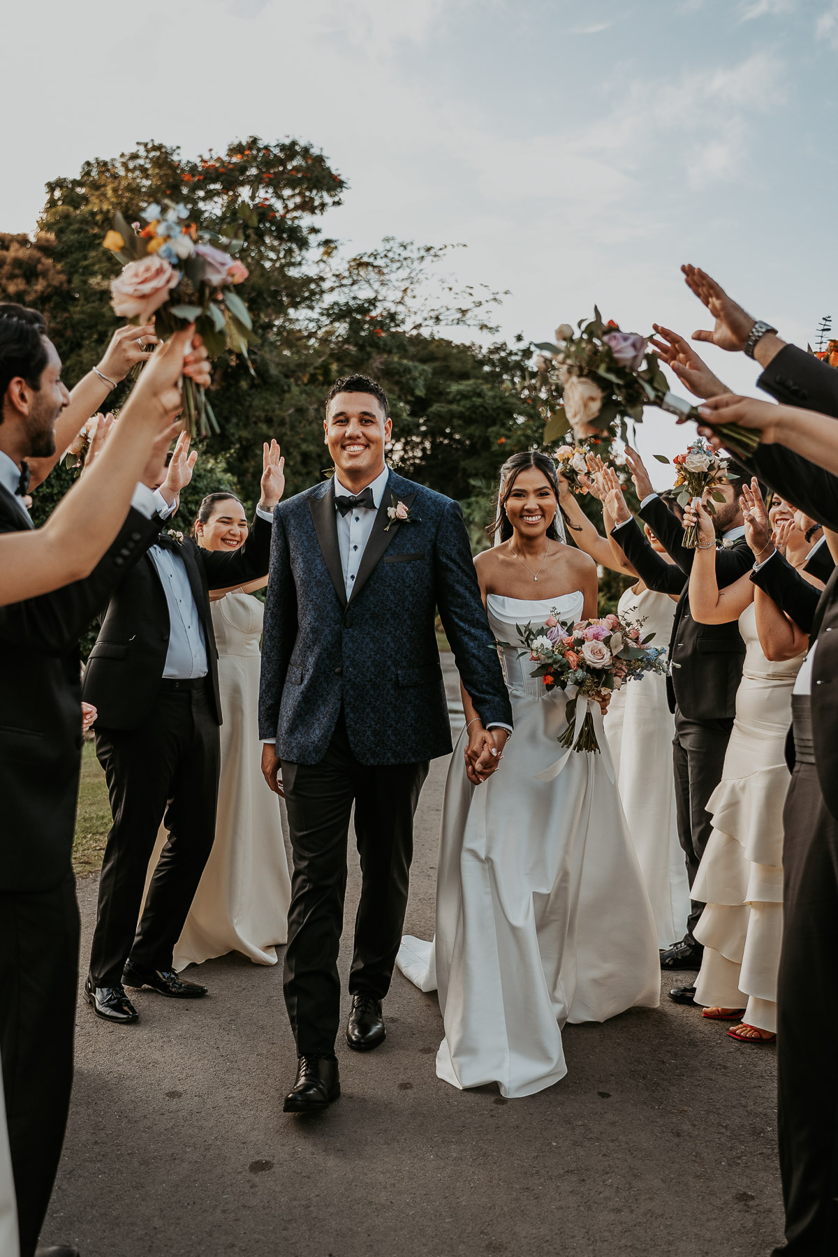 Wedding Party cheers couple during Hacienda Campo Rico wedding in Puerto Rico.