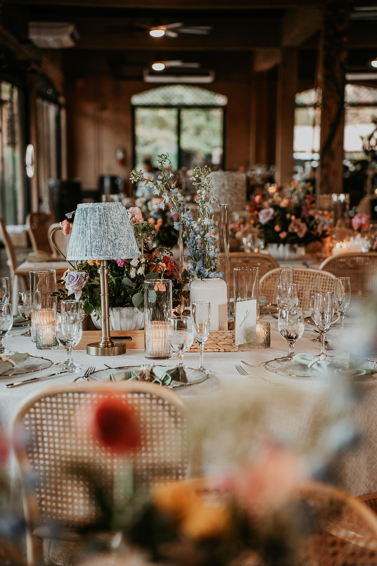 Rustic chic wedding tablescape with tropical florals at Campo Rico in Puerto Rico.