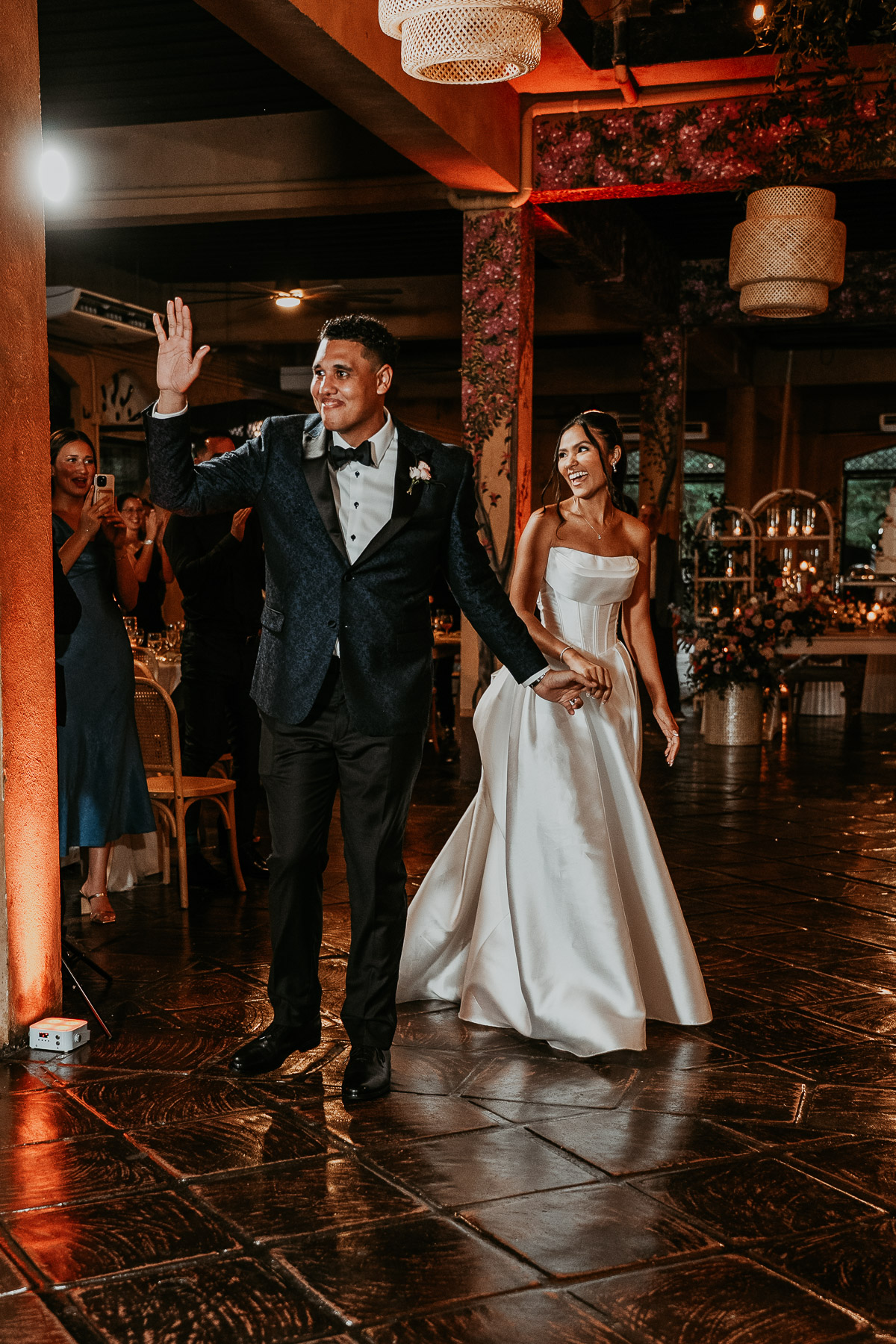 Bride and groom grand entrance at Hacienda Campo Rico wedding.