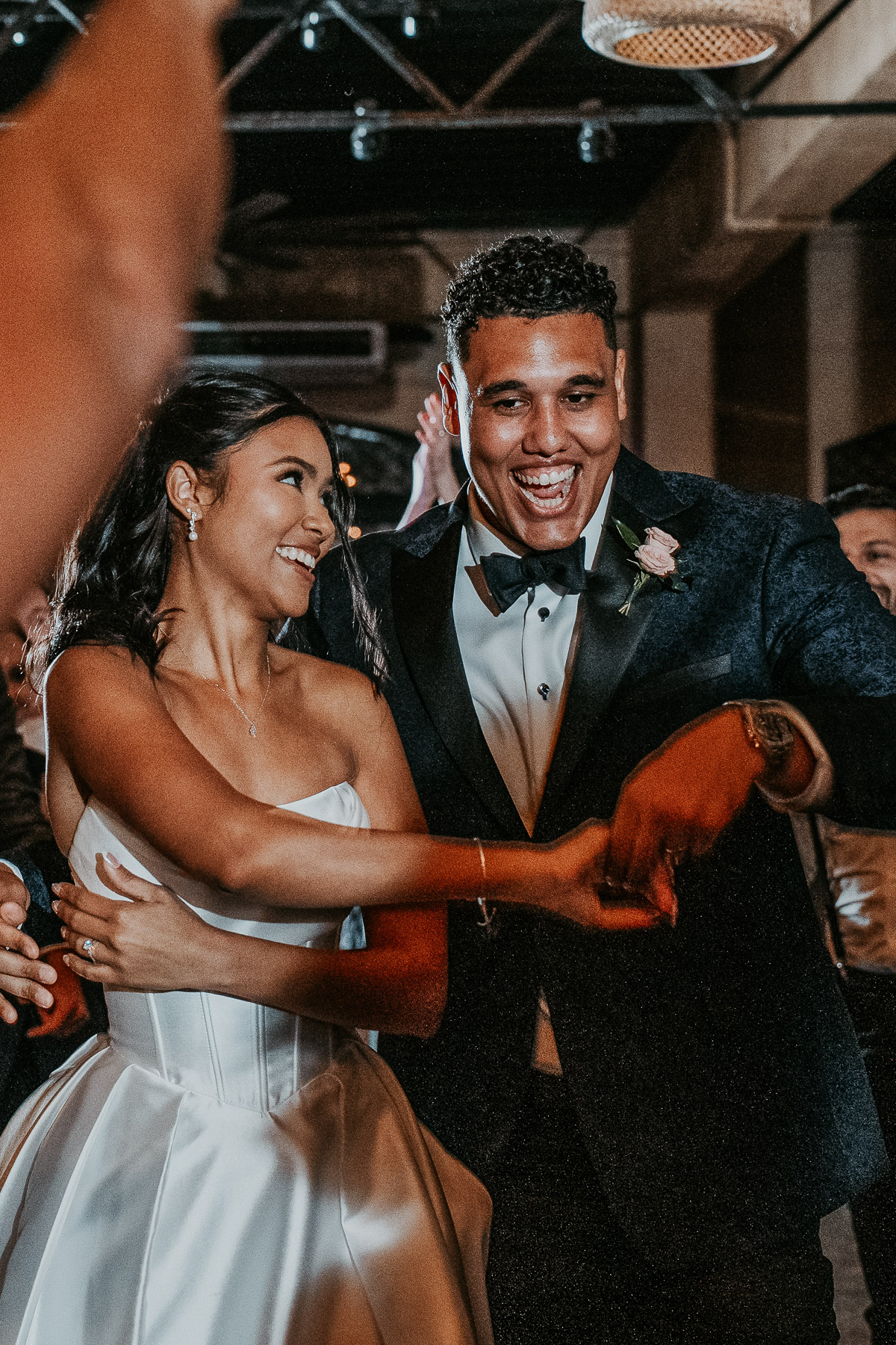 Wedding couple celebrating on the dance floor at Puerto Rico hacienda venue.