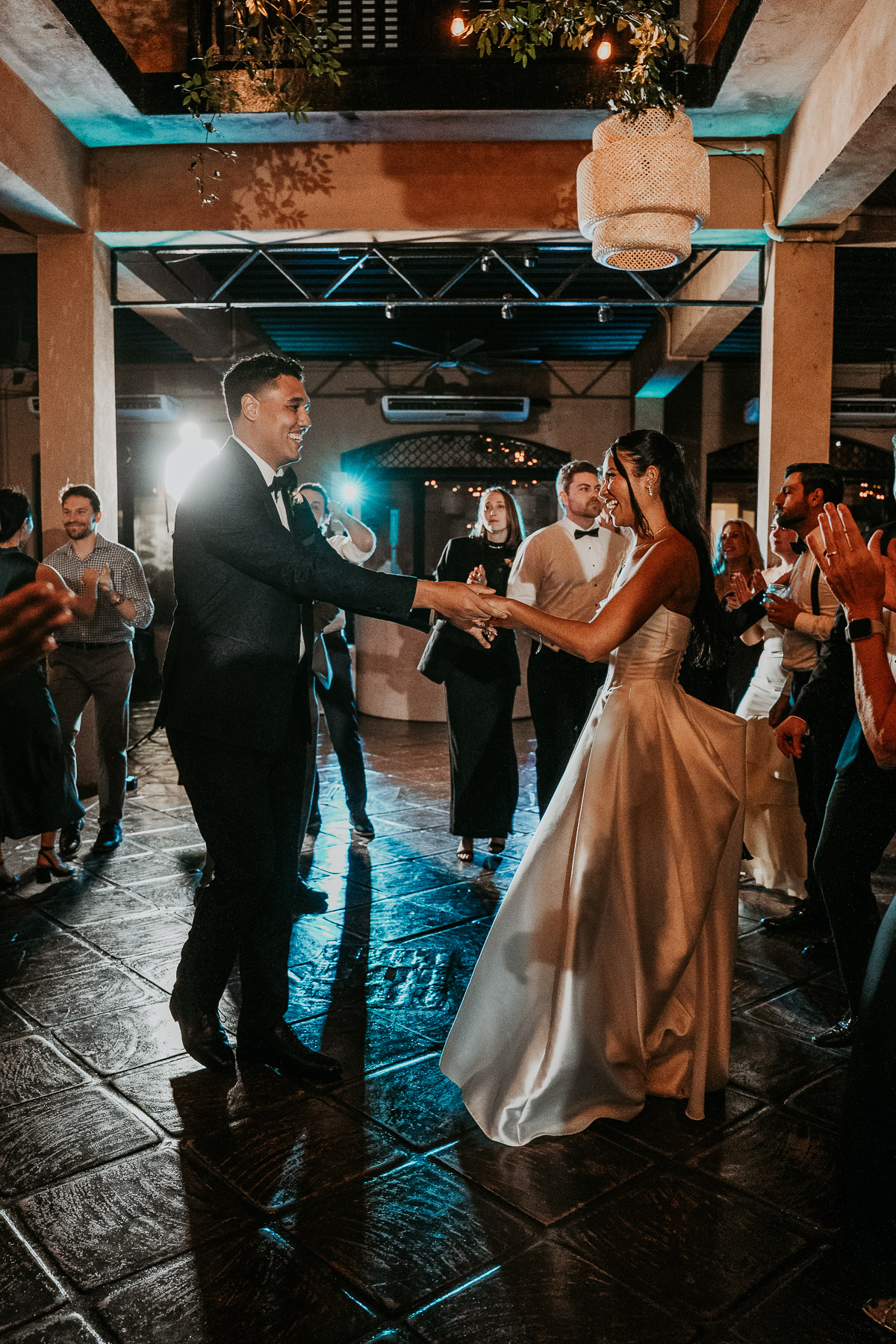 Wedding couple celebrating on the dance floor at Puerto Rico hacienda venue.