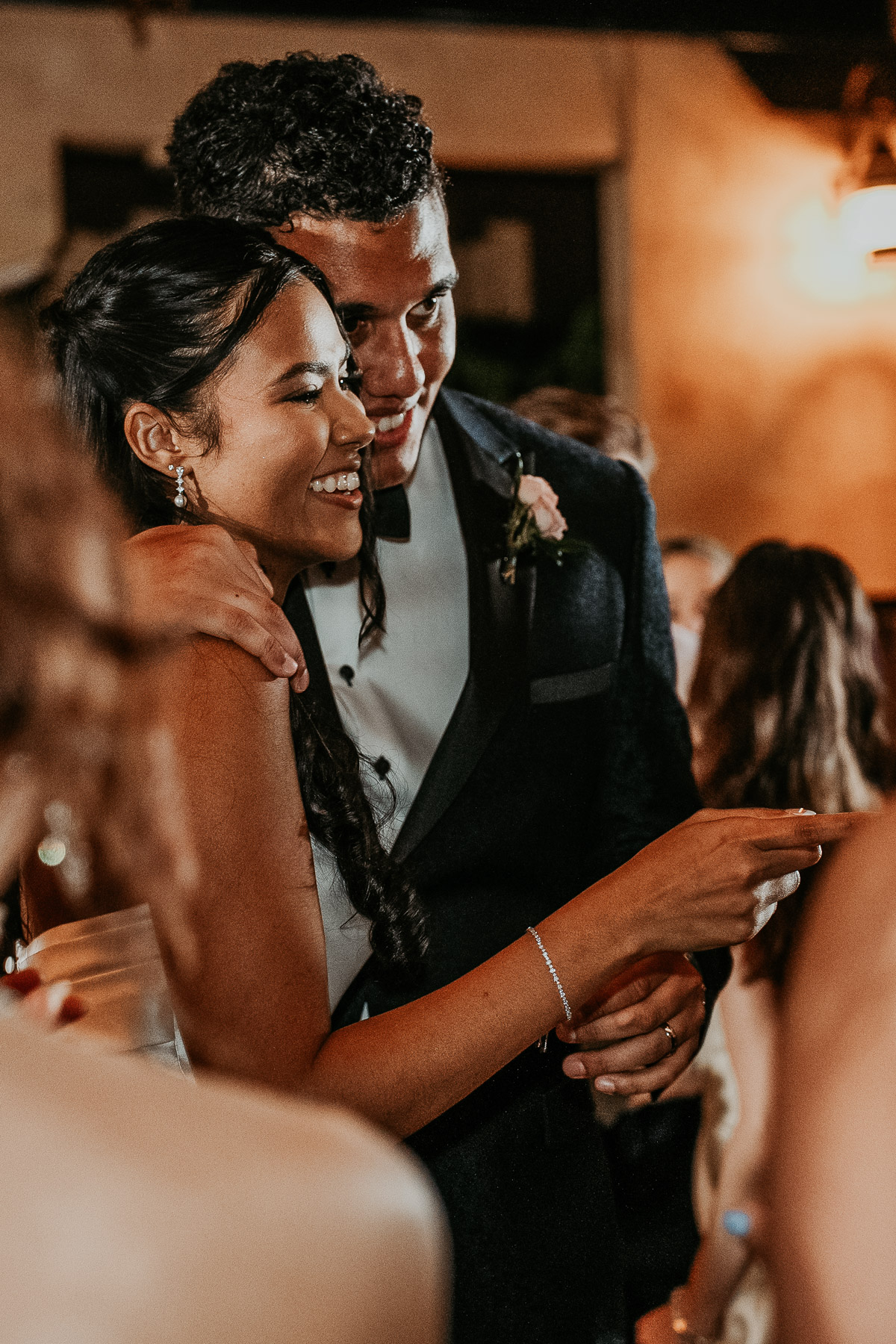 Wedding couple celebrating on the dance floor at Puerto Rico hacienda venue.