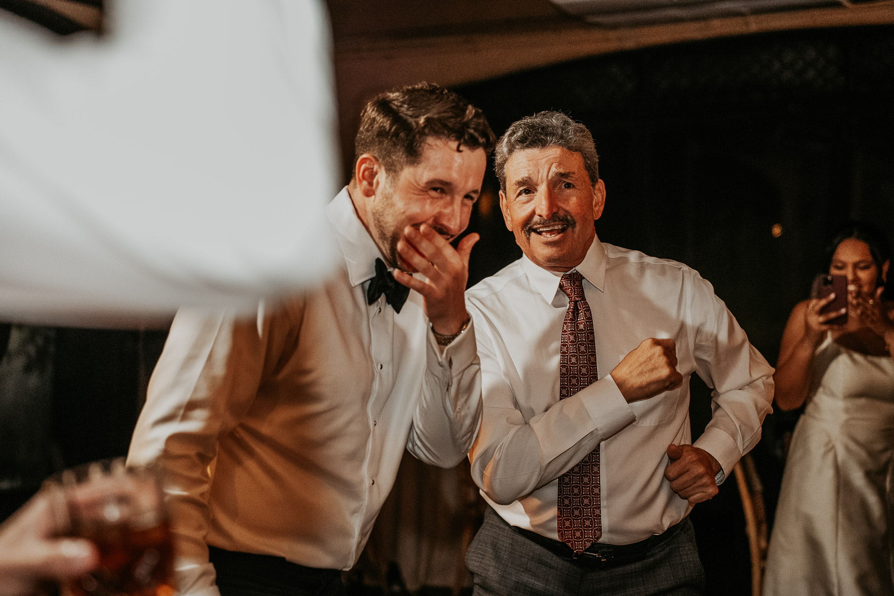 Wedding guests dancing during high energy reception at Hacienda Campo Rico.