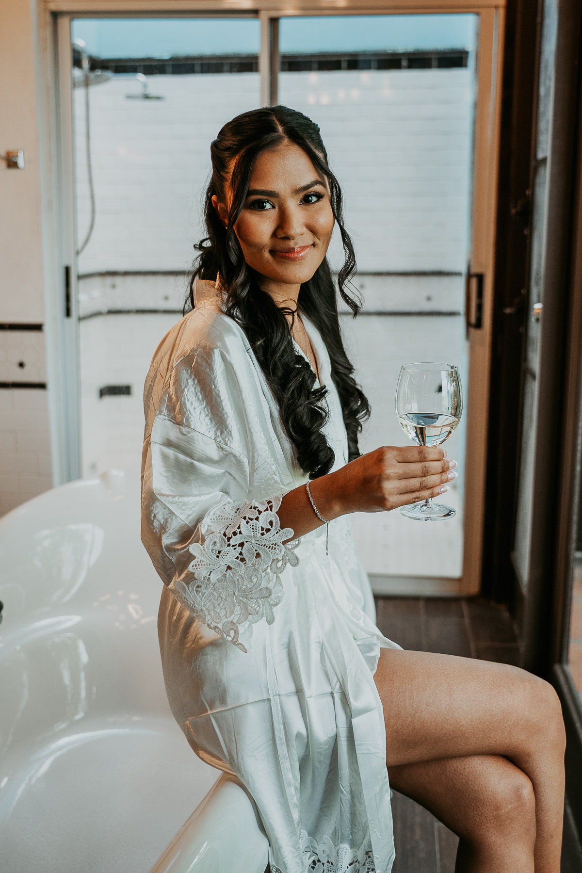 Bride candid portrait wearing robe at Hacienda Campo Rico wedding.