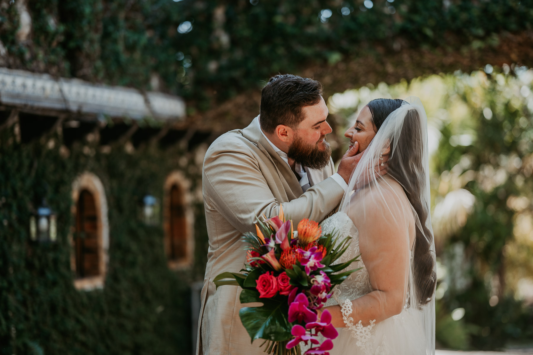 Couple sharing a candid moment near the bridge at Hacienda Siesta Alegre