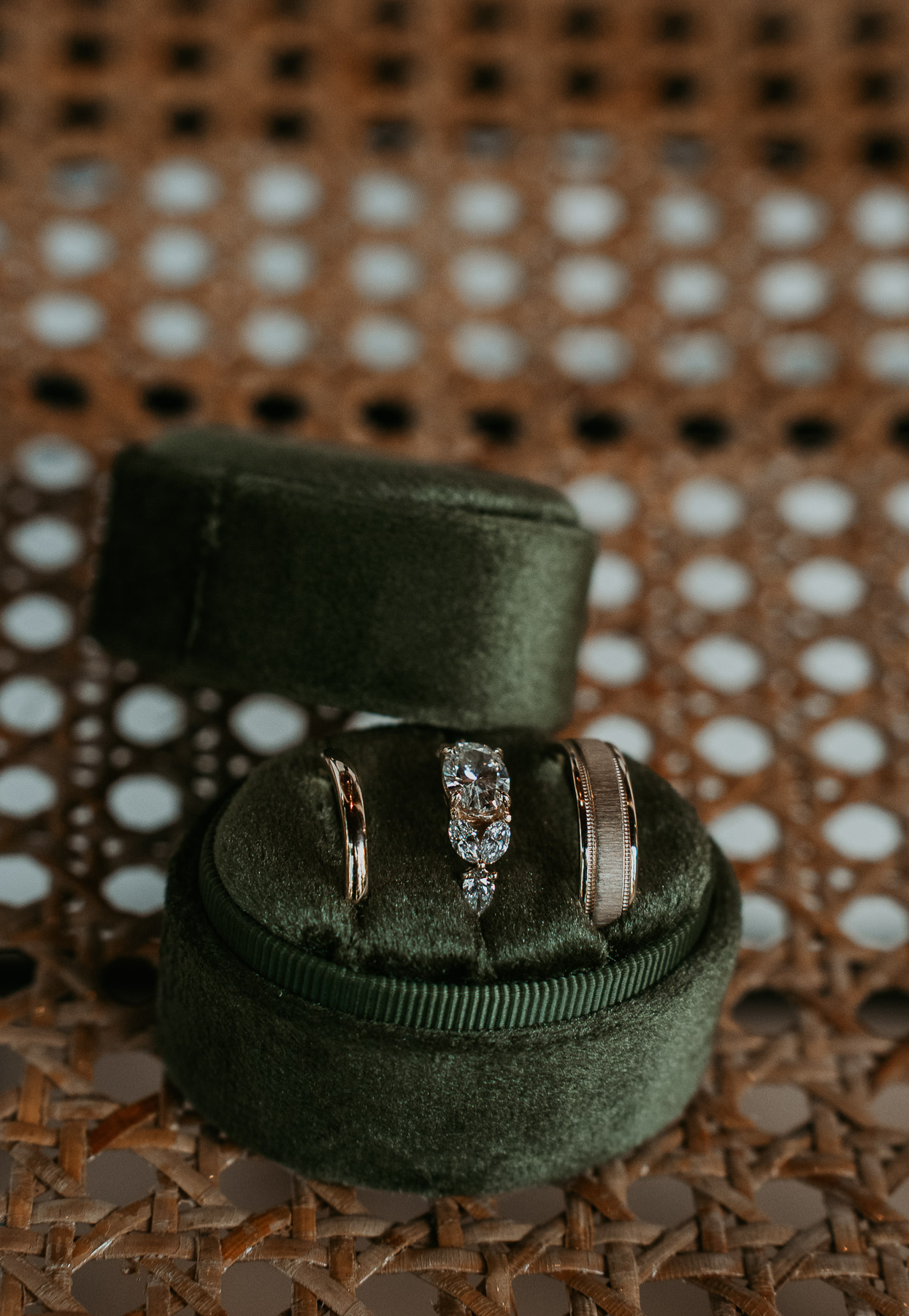 Close-up of wedding rings resting together