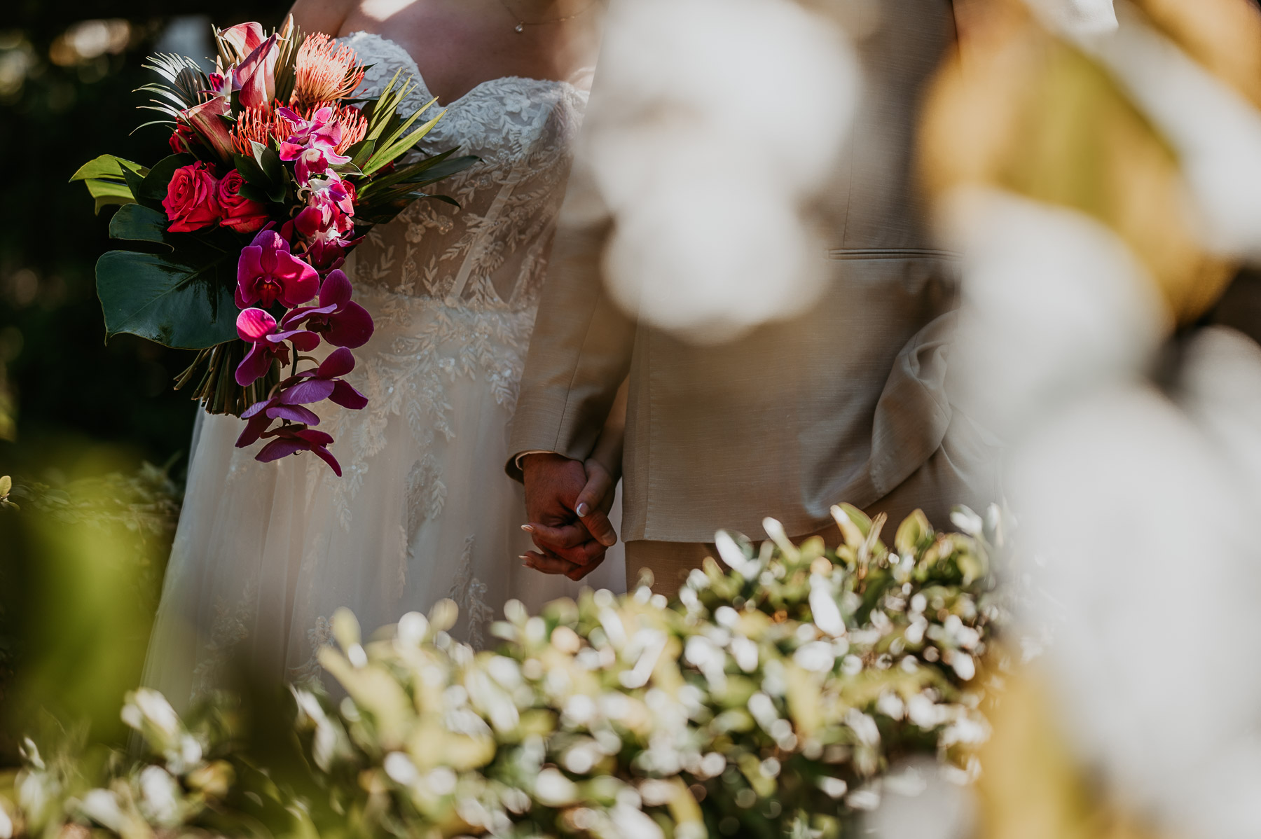 Bride walking down the aisle with parents during their Hacienda Siesta Alegre wedding