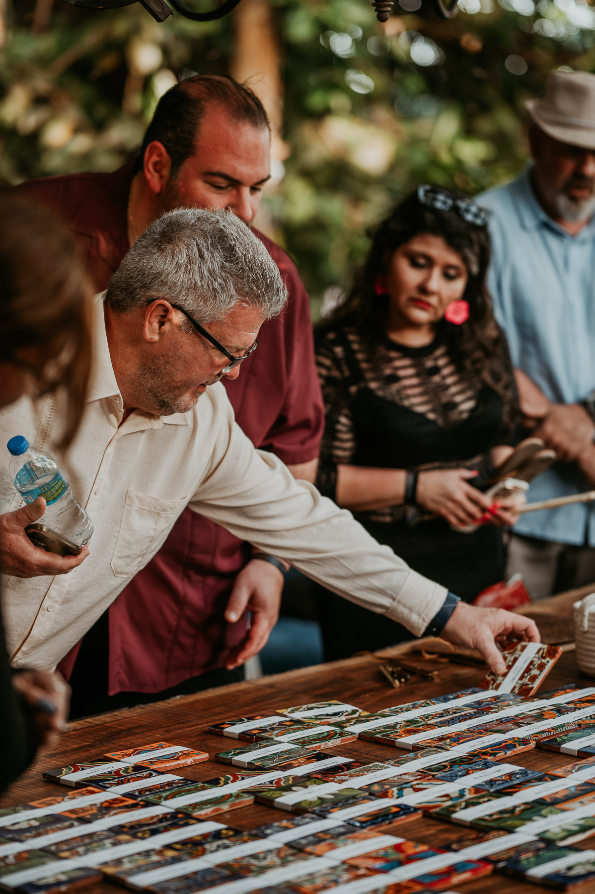 Guests gathering around the reception tables at Hacienda Siesta Alegre
