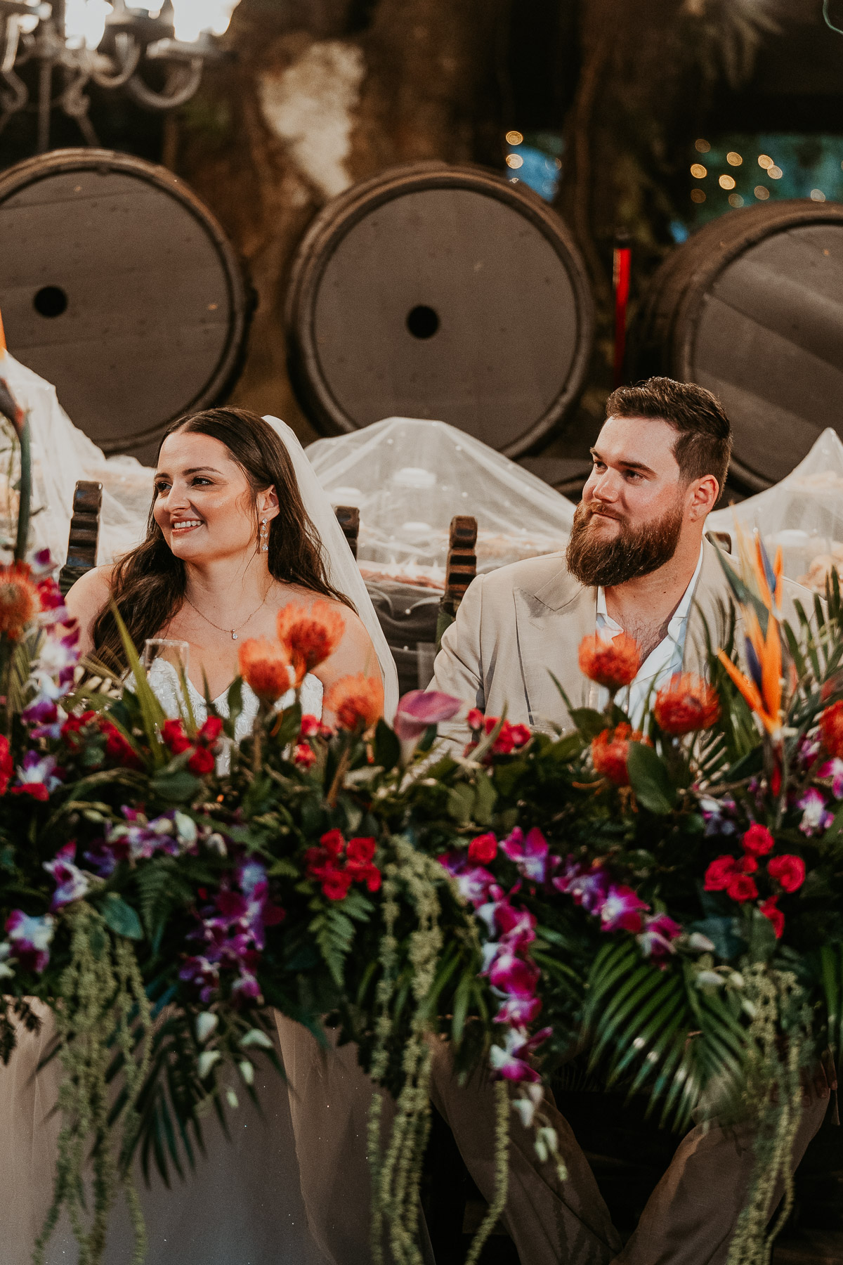 Wedding toast surrounded by smiling family and friends