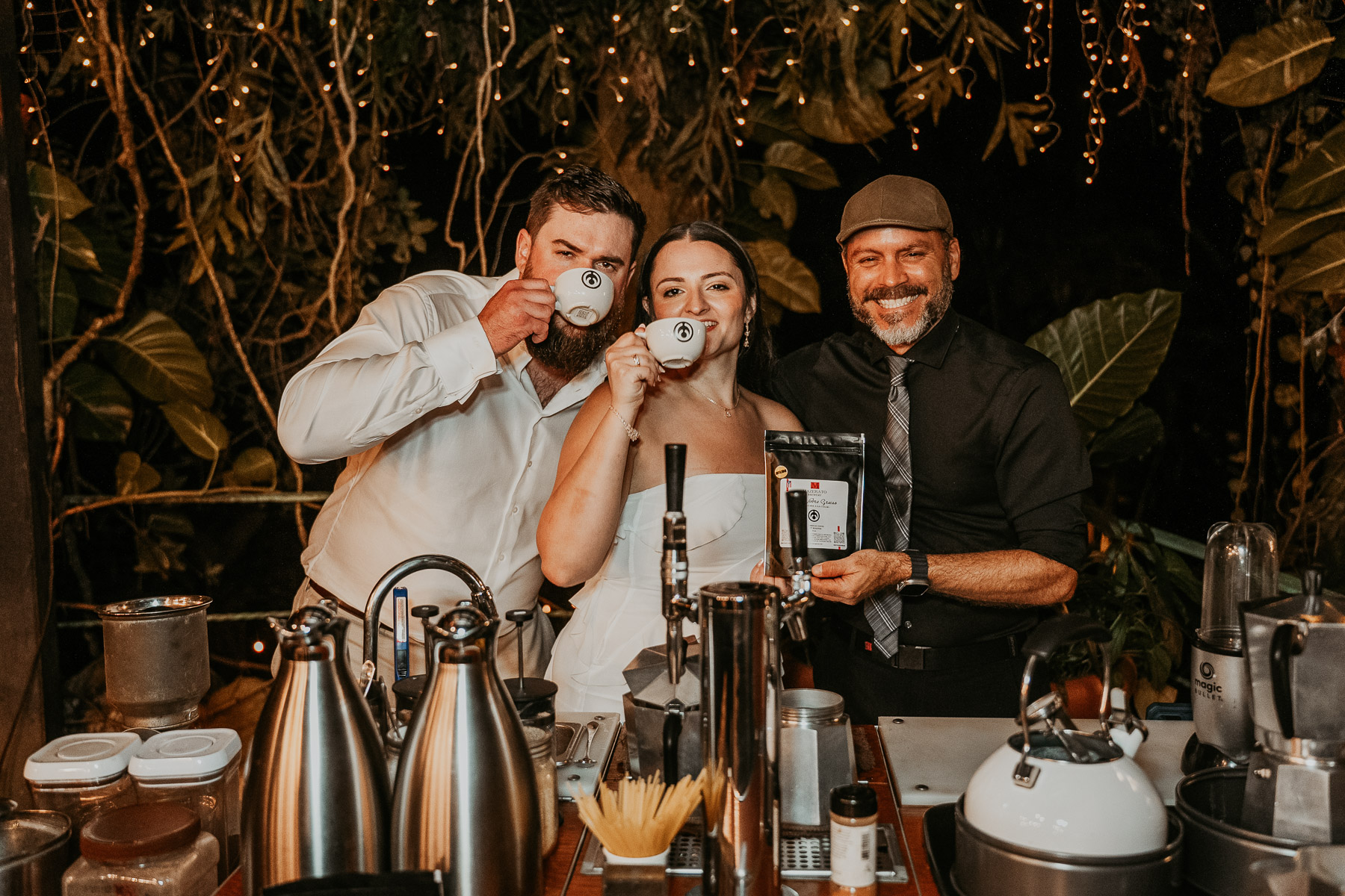 newlywed couple posing with local Puerto Rico coffee wedding favor vendor