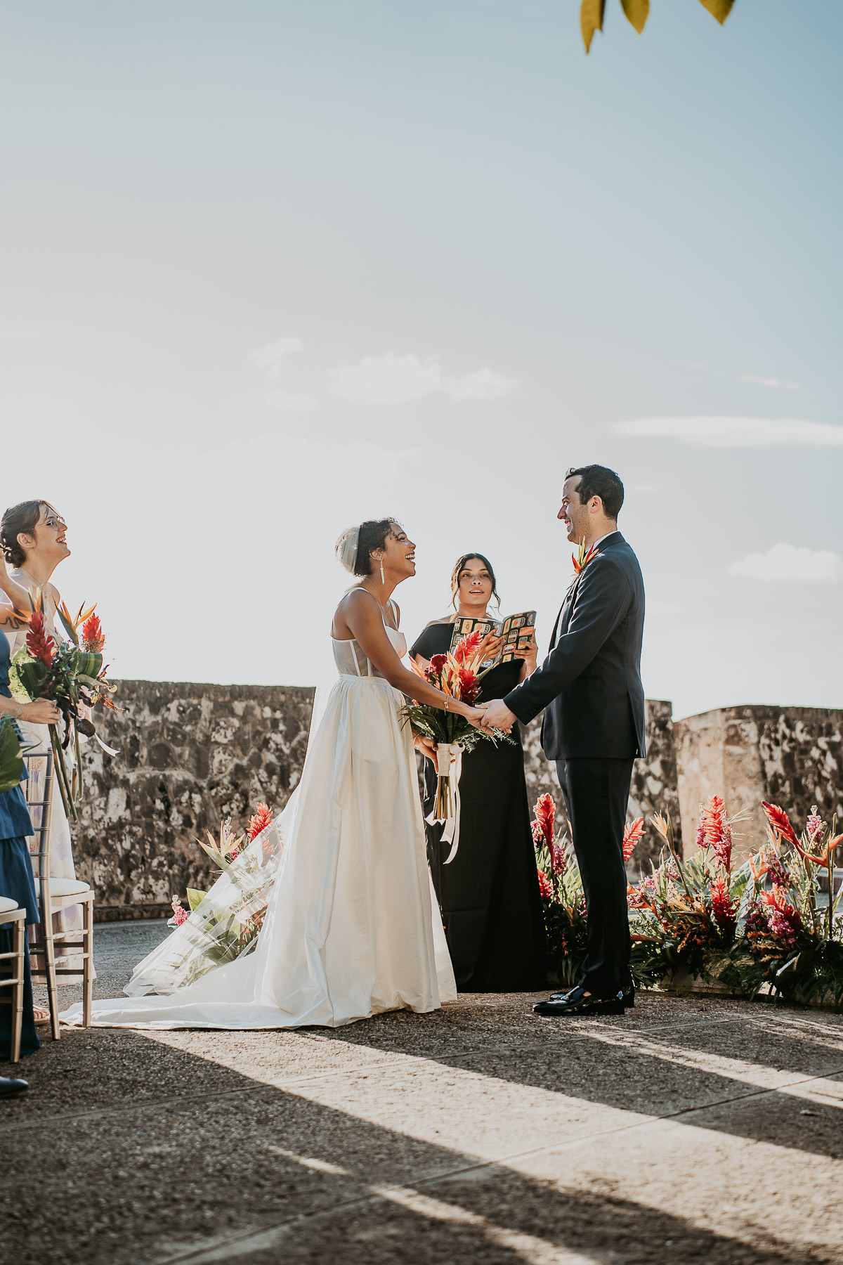 Wedding officiant speaking with the couple at La Rogativa.