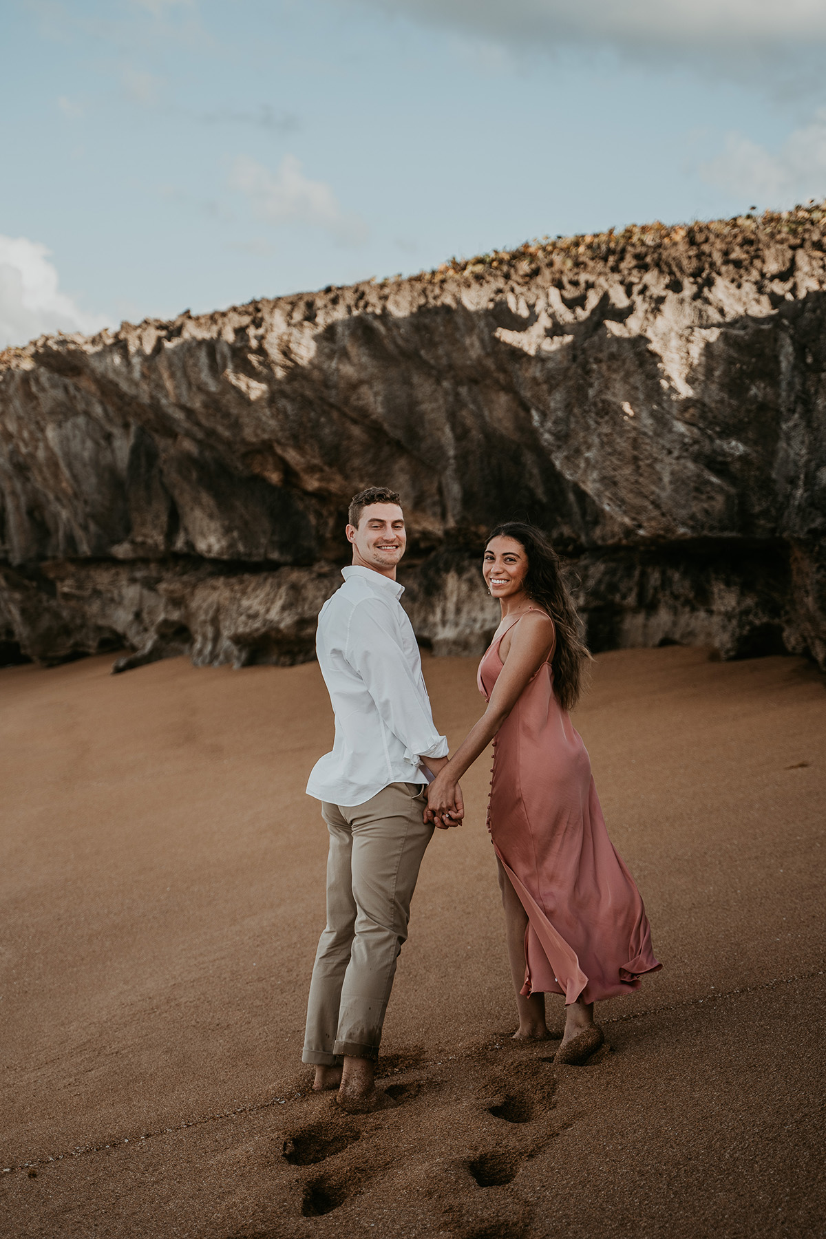 Candids of couple celebrating beach proposal in Puerto Rico.