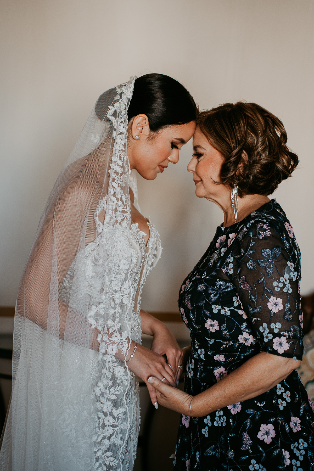 Bride and mom during her getting ready pcitures at hotel El Convento.