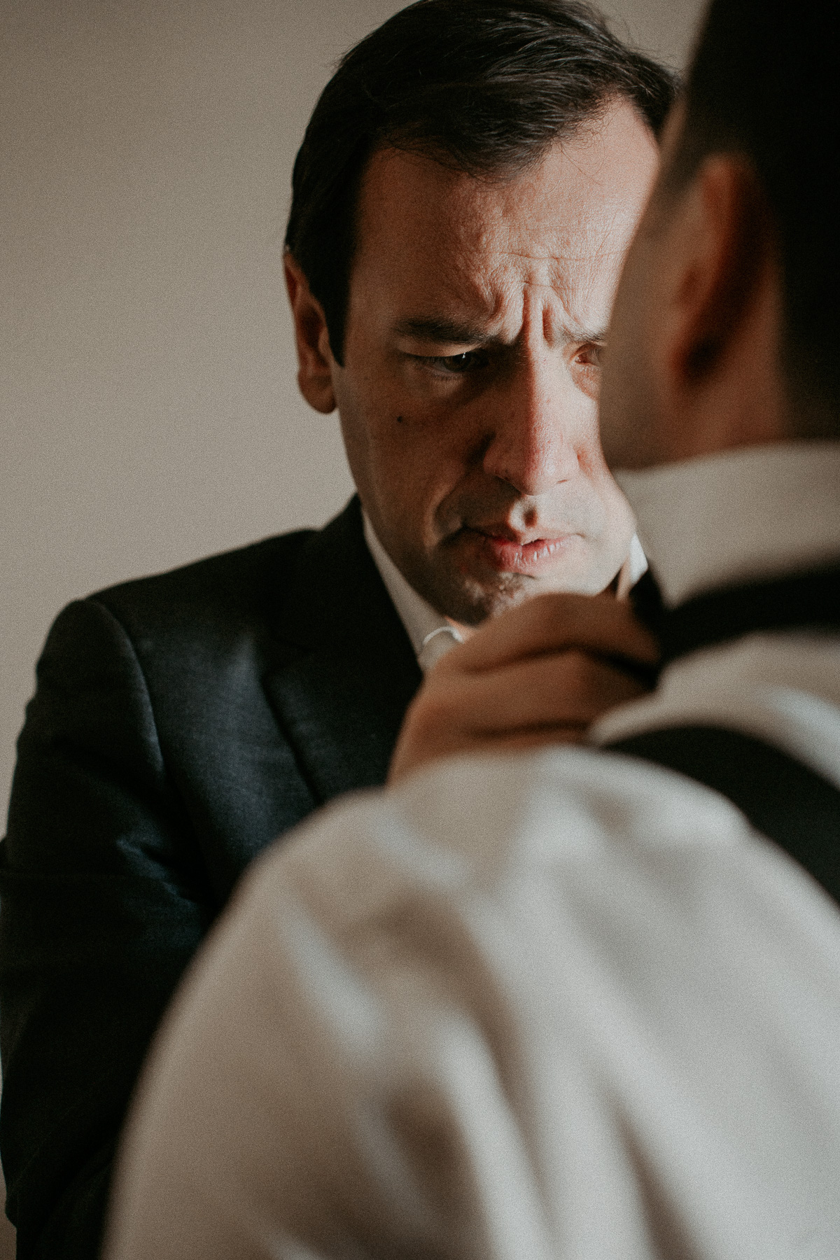 Groom portrait getting ready at Hotel El Convento.