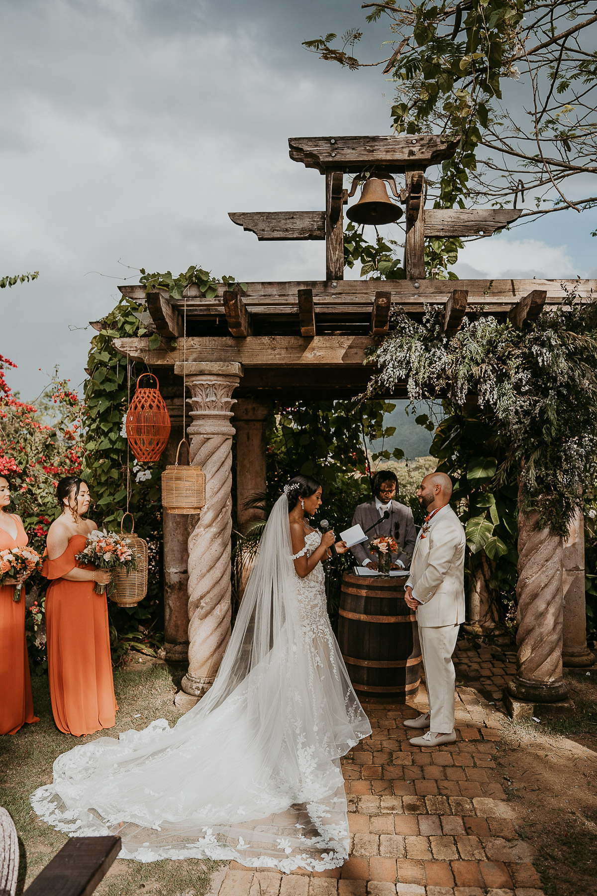 reading of vows with El Yunque background at Hacienda Siesta Alegre Wedding.