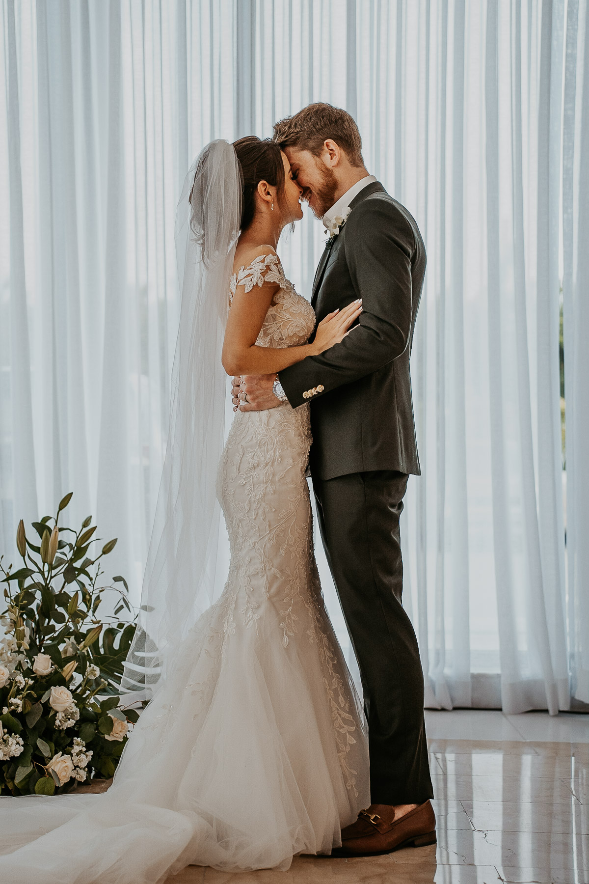 First kiss at Indoor ceremony at Hyatt Regency Grand Reserve Wedding.